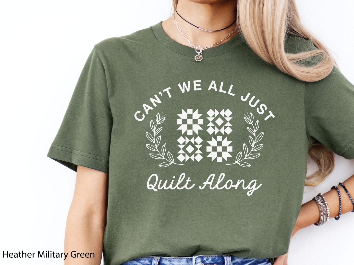 Cozy quilt-themed long sleeve t-shirt with the phrase “Can’t We Just All Quilt Along,” perfect gift for a quilter, ideal for sewing days, quilt retreats, and craft fairs.