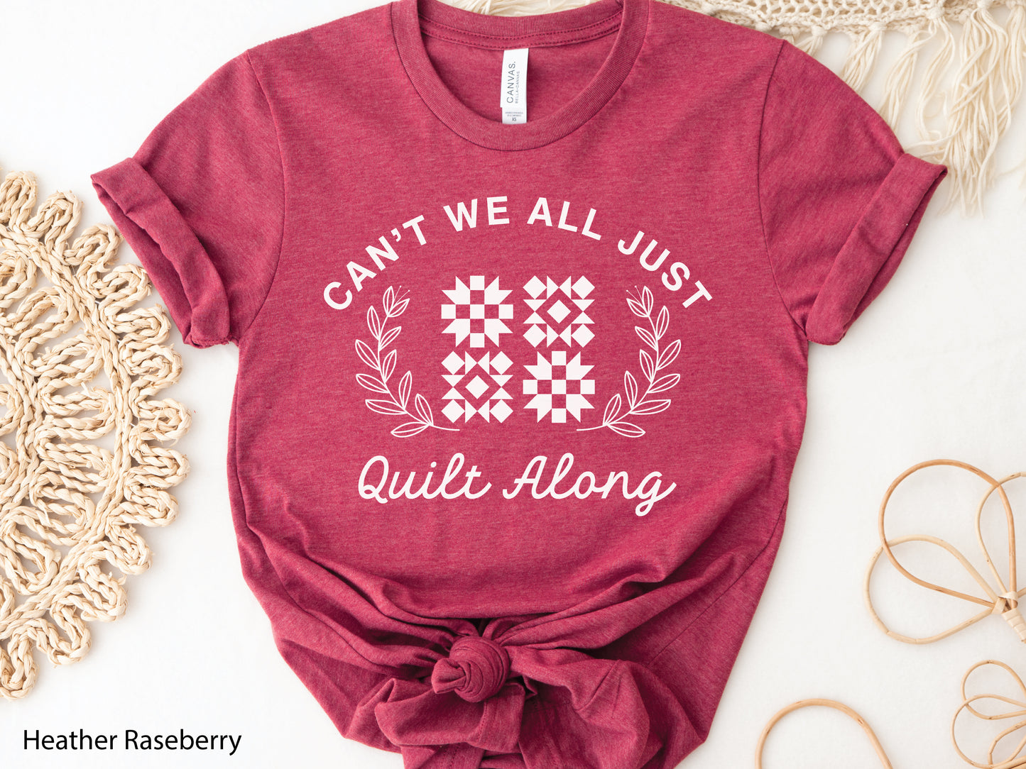 Cozy quilt-themed long sleeve t-shirt with the phrase “Can’t We Just All Quilt Along,” perfect gift for a quilter, ideal for sewing days, quilt retreats, and craft fairs.
