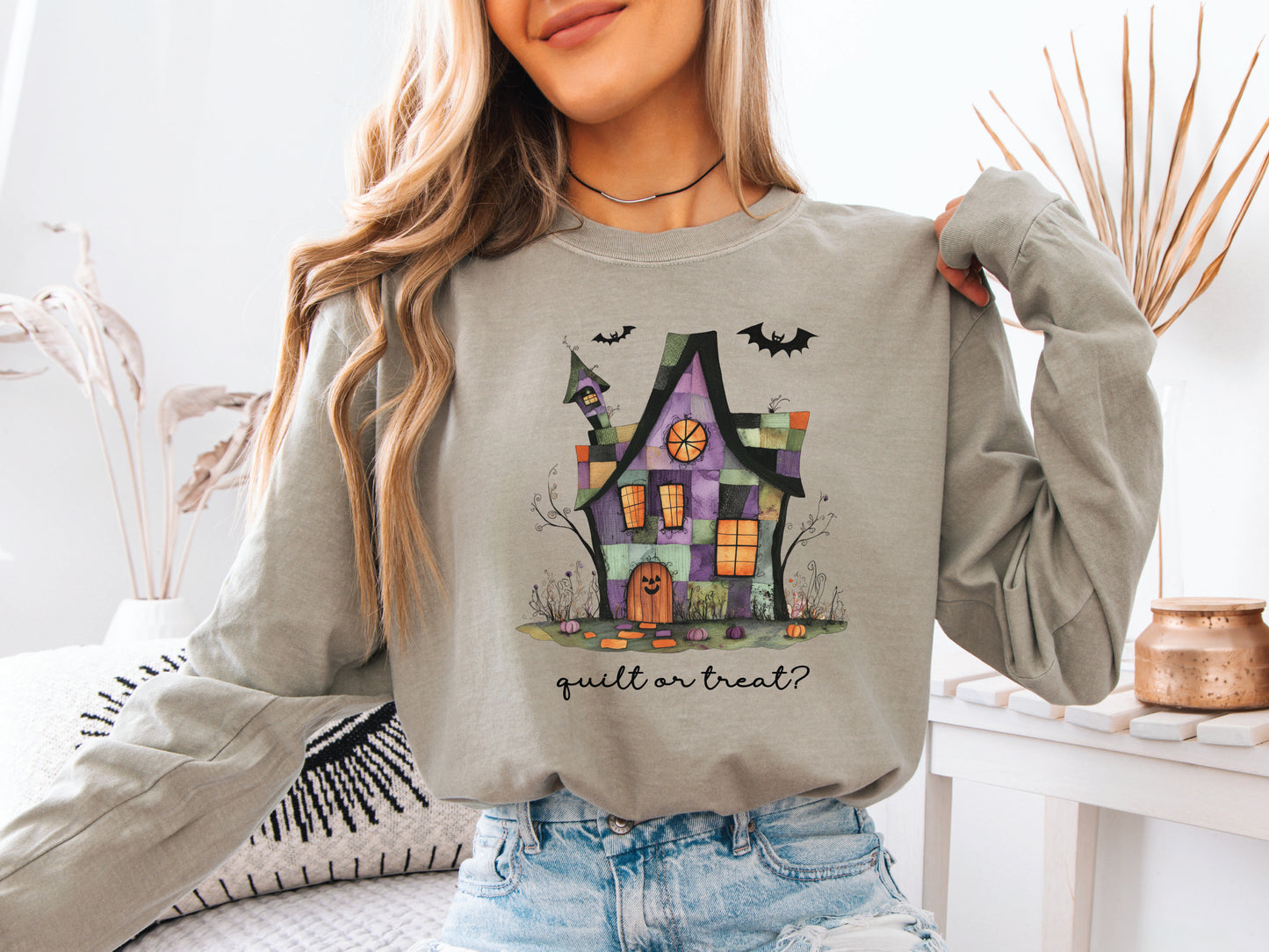 Quilt or Treat Halloween t-shirt on a Comfort Colors Sandstone tee—fun Halloween gift for quilters, perfect for spooky season sewing and retreats.