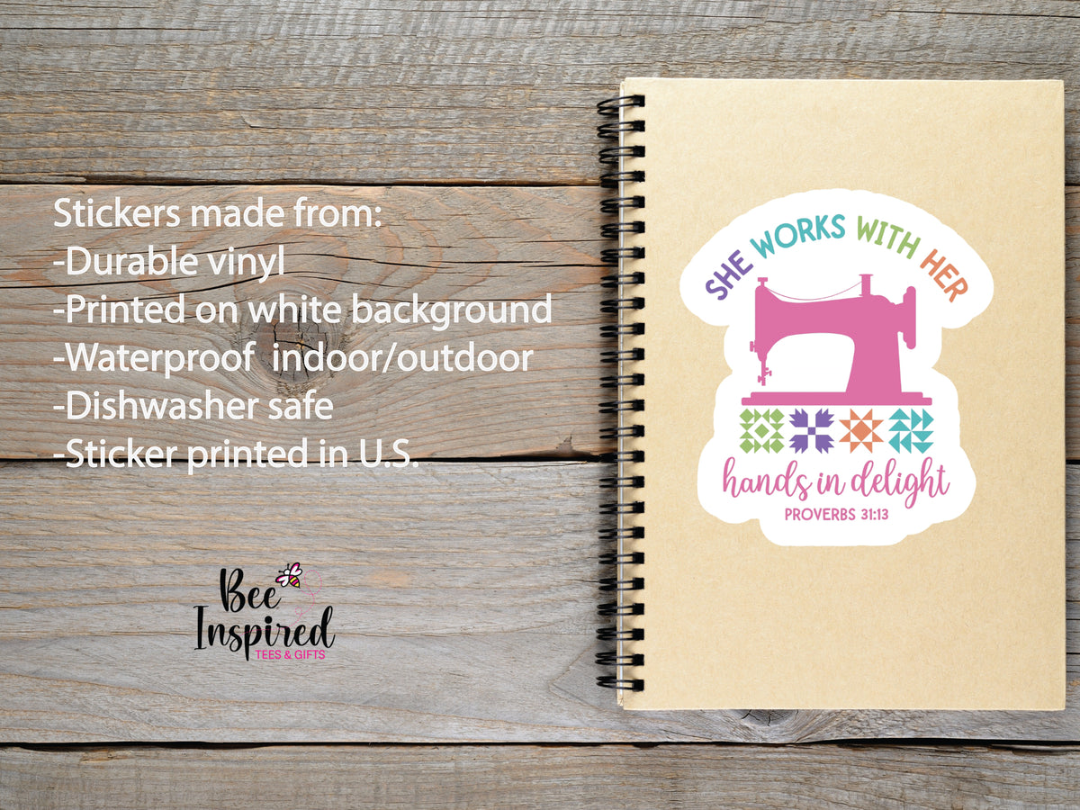 She Works With Her Hands vinyl sticker featuring a vintage sewing machine, colorful quilt blocks, and the inspirational Proverbs 31:13 verse.