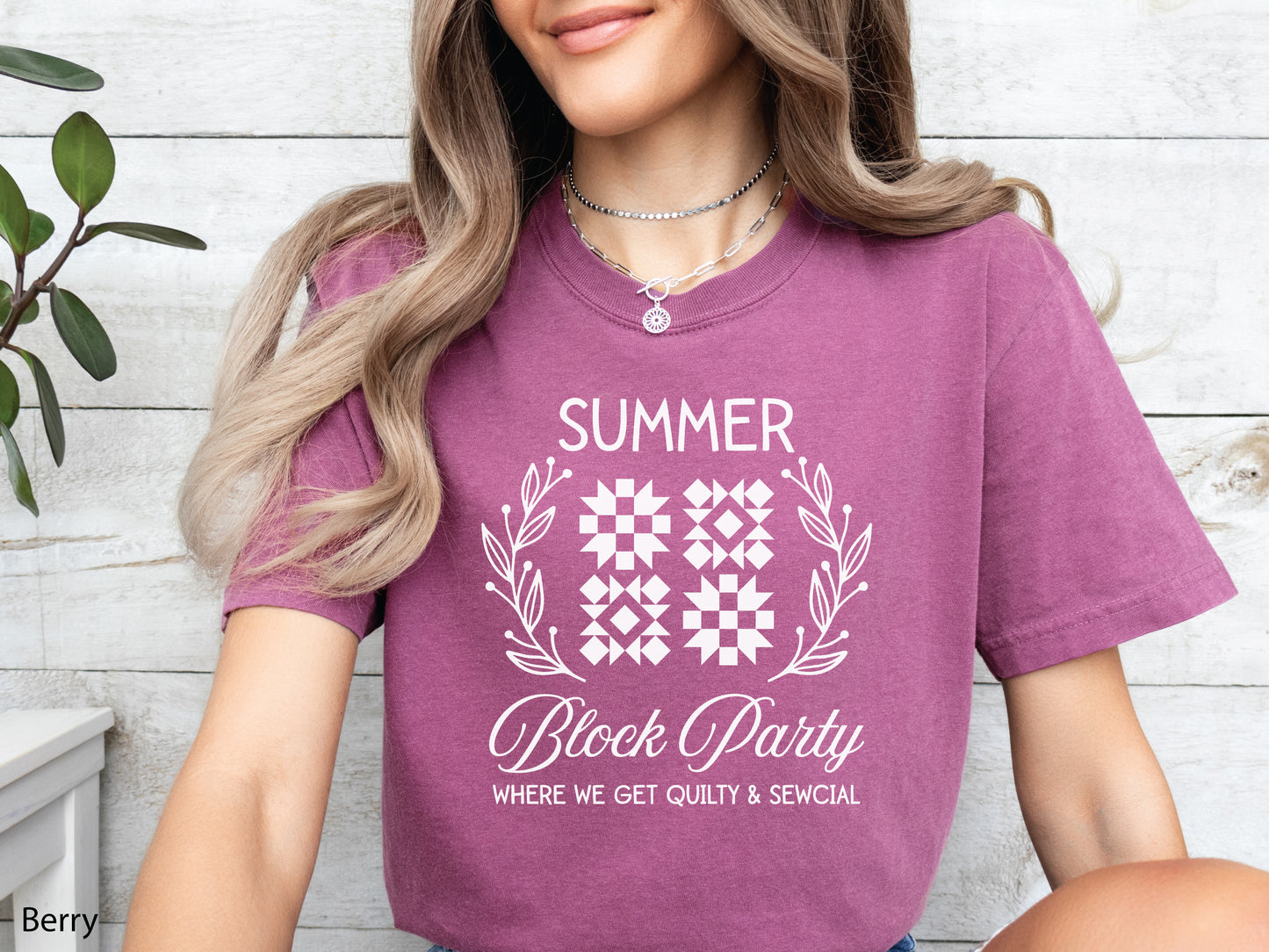 Summer quilt block t-shirt with the phrase “Where We Get Quilty & Sewcial,” a fun gift for quilters and sewists. Perfect for retreats, sew days, and summer stitching sessions.