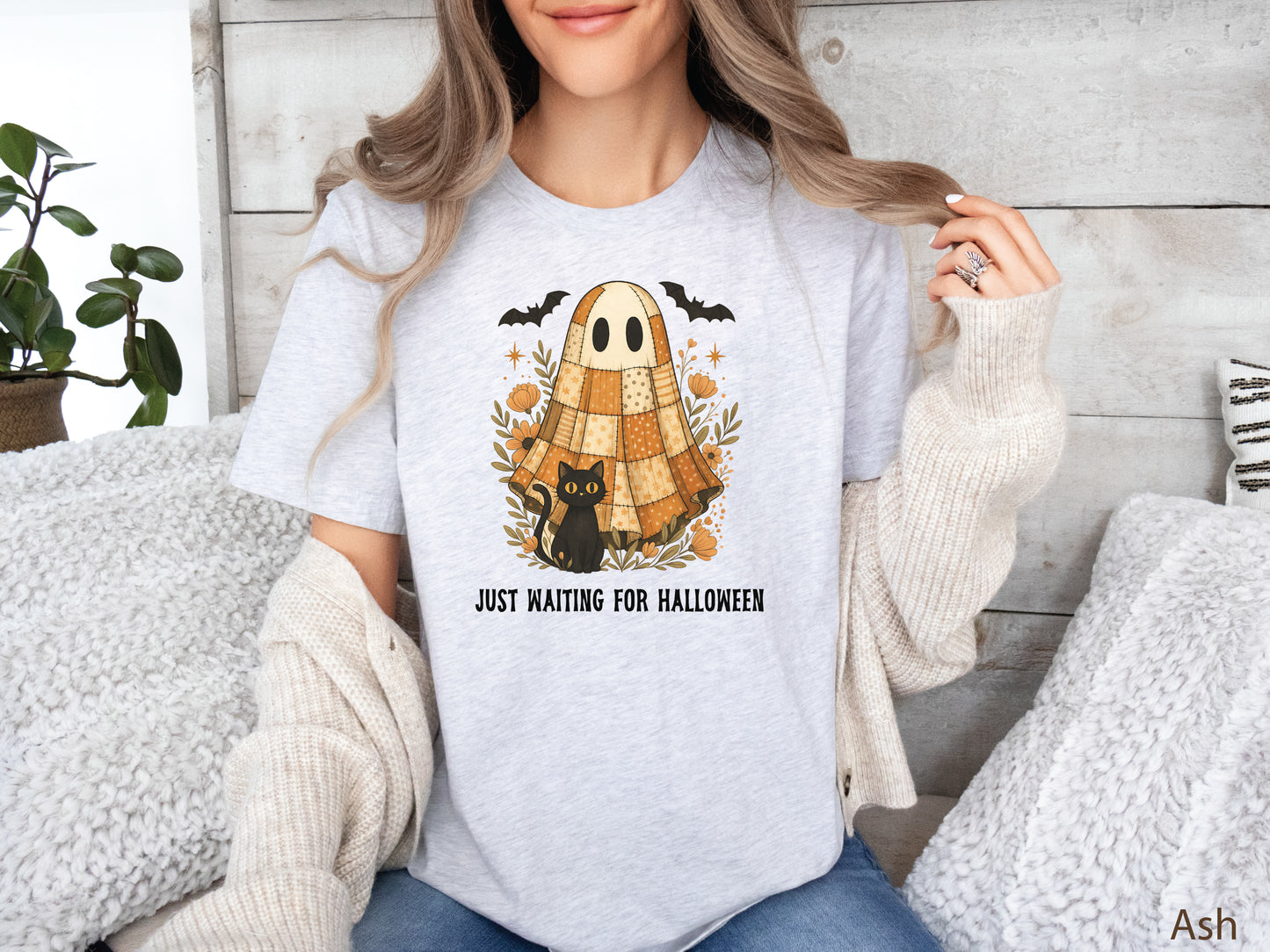 Just Waiting For Halloween t-shirt in Ash with quilt block ghost and black cat design—fun spooky quilting shirt, perfect gift for quilters.