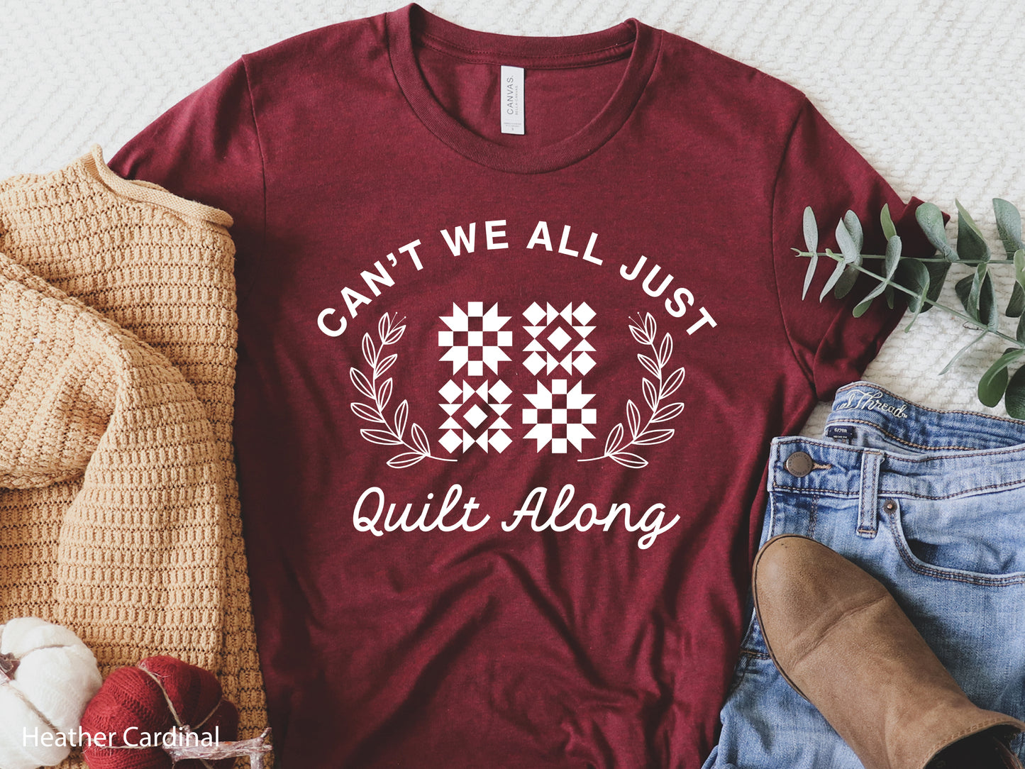 Cozy quilt-themed long sleeve t-shirt with the phrase “Can’t We Just All Quilt Along,” perfect gift for a quilter, ideal for sewing days, quilt retreats, and craft fairs