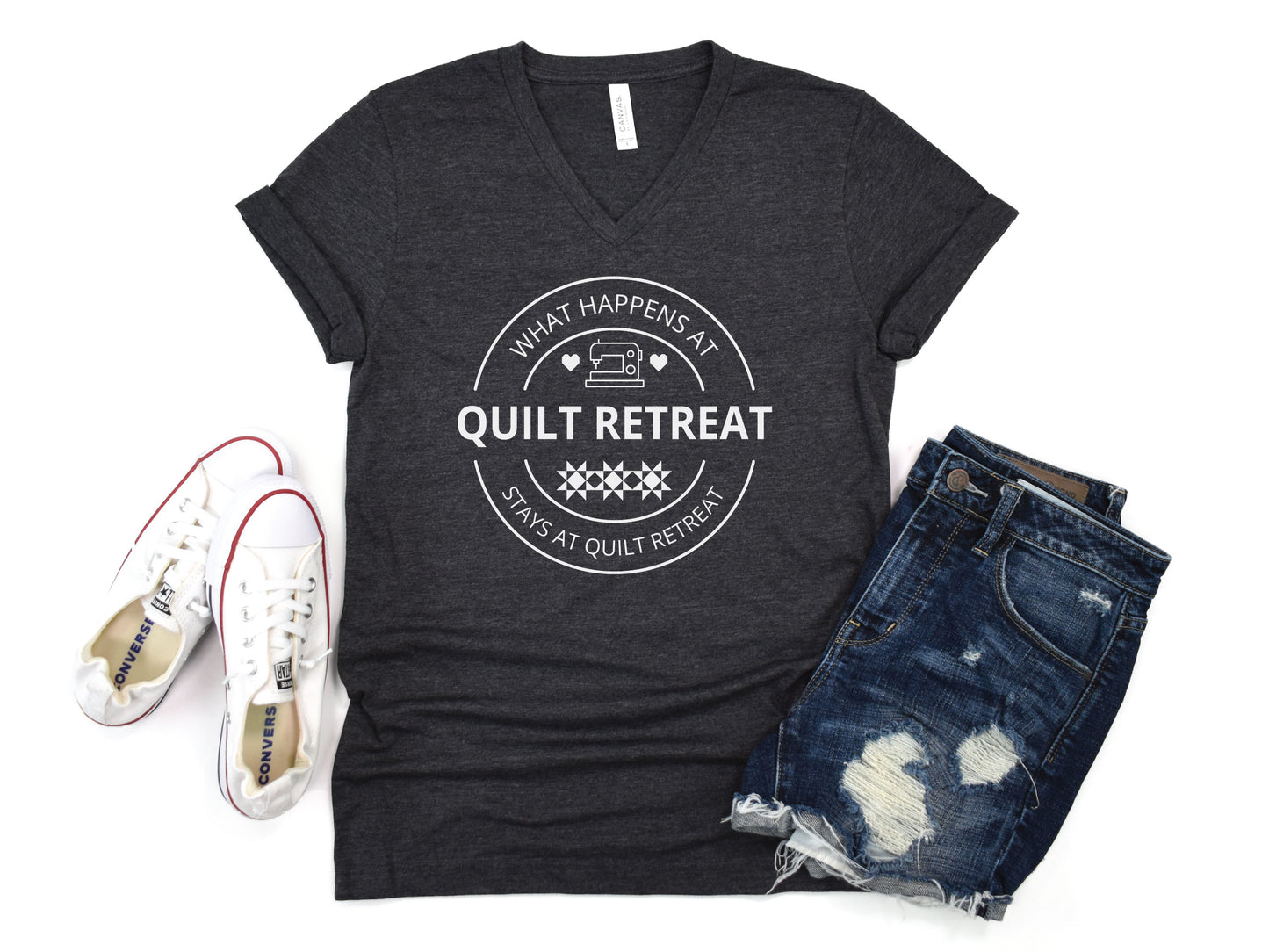 What Happens at Quilt Retreat t-shirt in black, fun quilting-themed gift for quilters and stitching crews. Dark Grey Bella V-Neck Shirt.