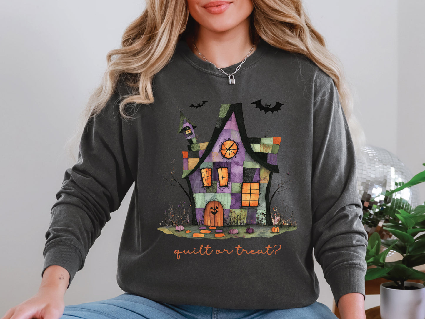 Quilt or Treat Halloween t-shirt on a Comfort Colors Pepper tee—fun Halloween gift for quilters, perfect for spooky season sewing and retreats.