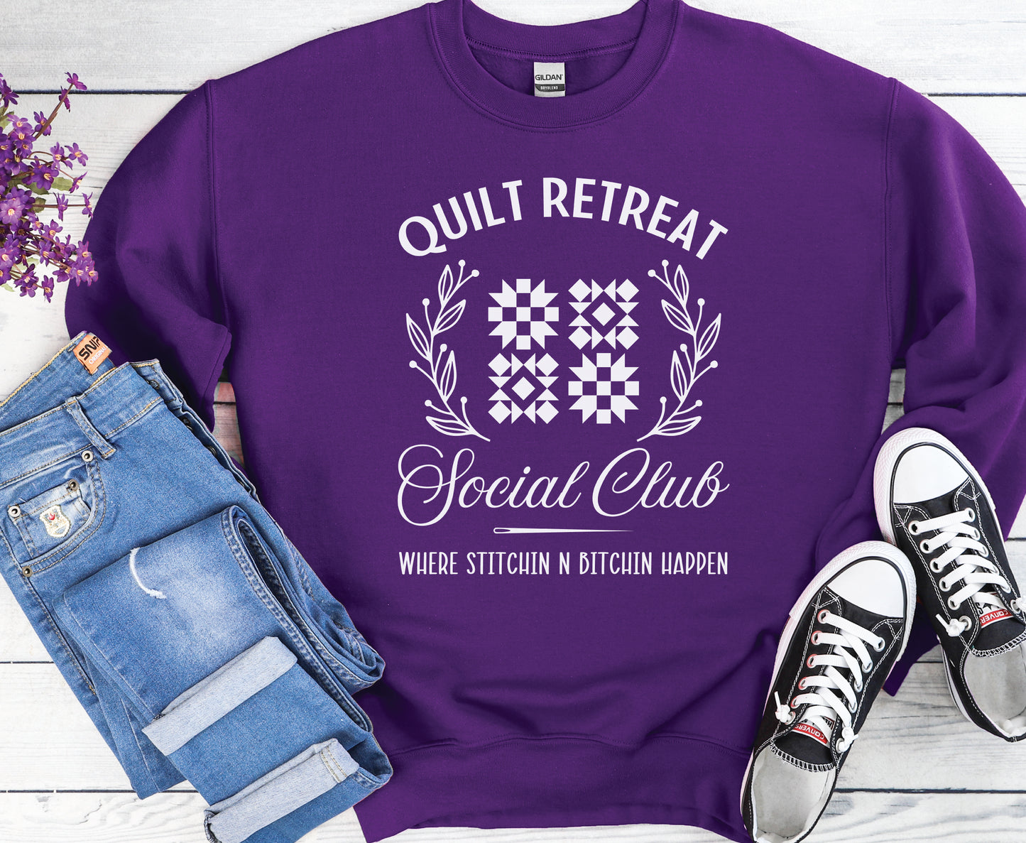 Get cozy and laugh in style with the Pruple Quilt Retreat Social Club t-shirt from Bee Inspired Tees. Funny quilting shirts and gifts for quilters—perfect for retreats, guilds, and sewing days!