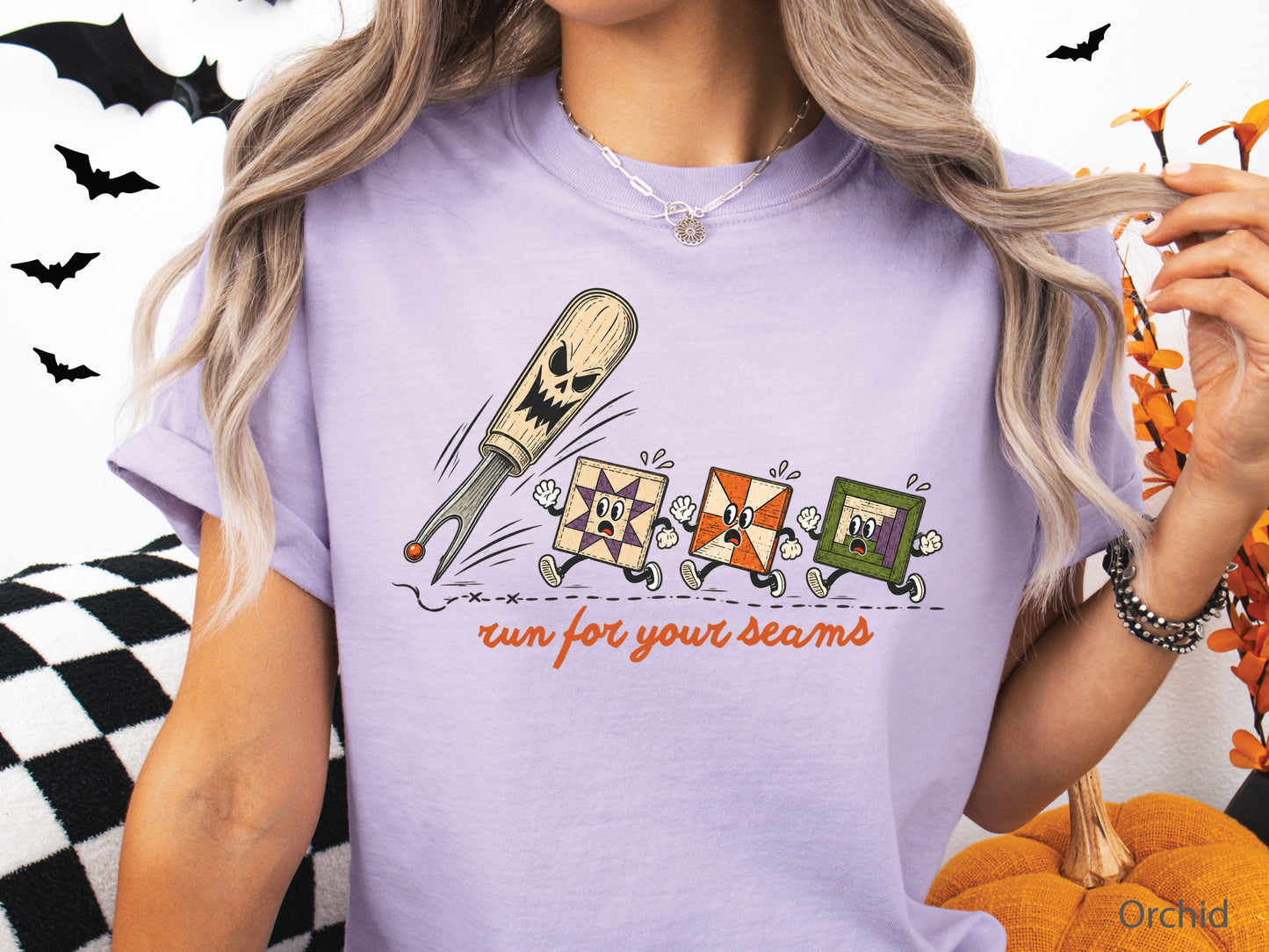 Run for Your Seams Halloween quilting design featuring a spooky seam ripper chasing three frightened colorful quilt blocks in a vintage-inspired style.