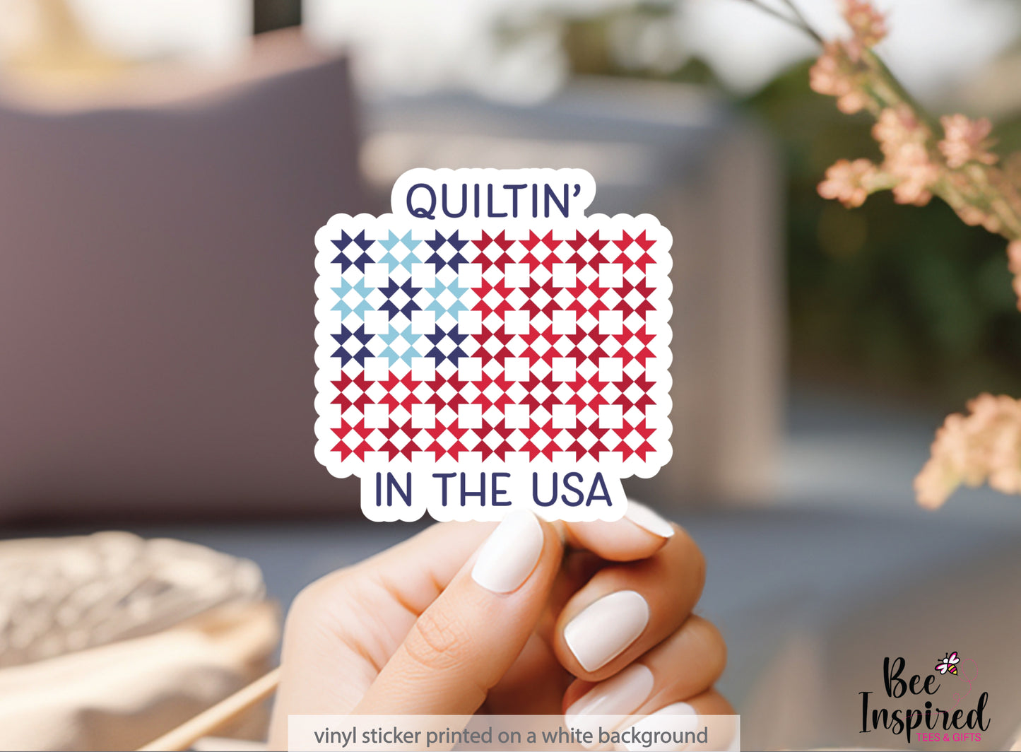 Patriotic “Quiltin’ In The USA” vinyl sticker with red, white, and blue quilt blocks on a white background, perfect for quilters and America’s 250th celebration
