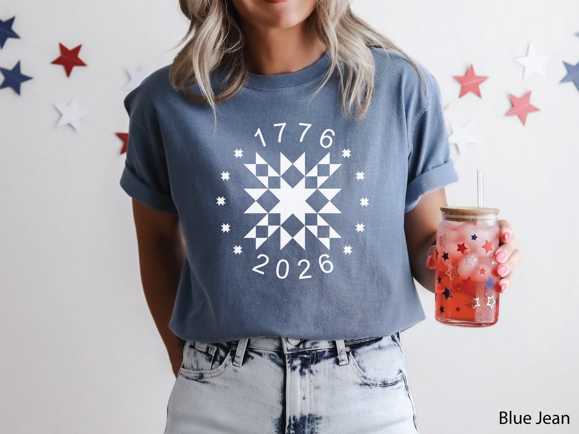 Patriotic quilting t-shirt in navy featuring a white star quilt block with surrounding stars and the years 1776–2026, celebrating America’s 250th Anniversary.