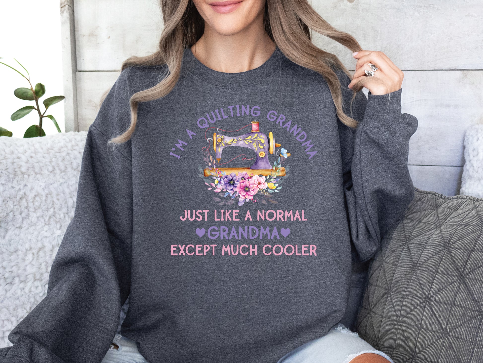 “I’m a Quilting Grandma” sweatshirt with floral sewing machine design and the phrase “Just Like a Normal Grandma Except Much Cooler.” Cozy gift for quilters from Bee Inspired Tees. 🧵✂️