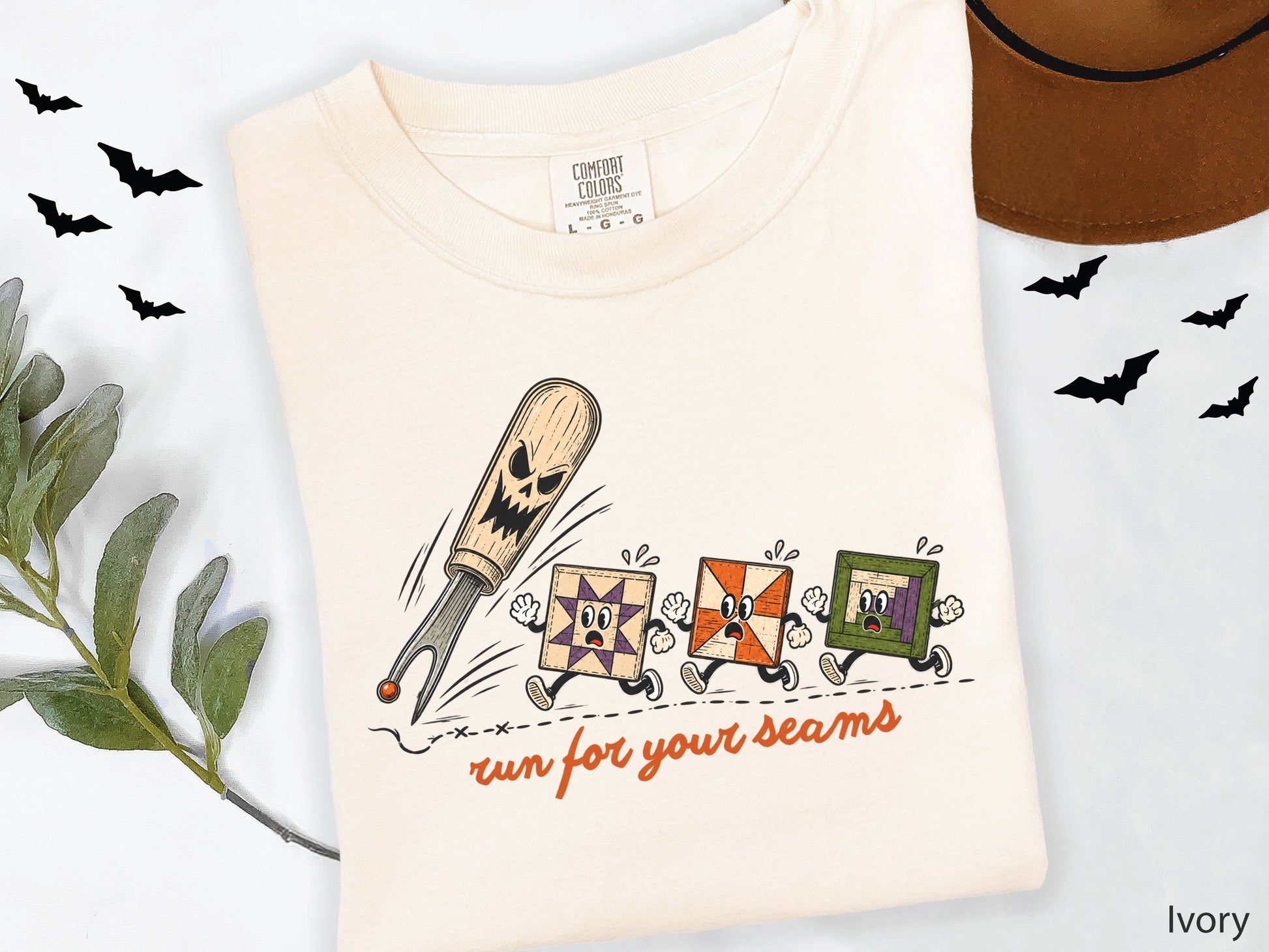 Run for Your Seams Halloween quilting design featuring a spooky seam ripper chasing three frightened colorful quilt blocks in a vintage-inspired style.
