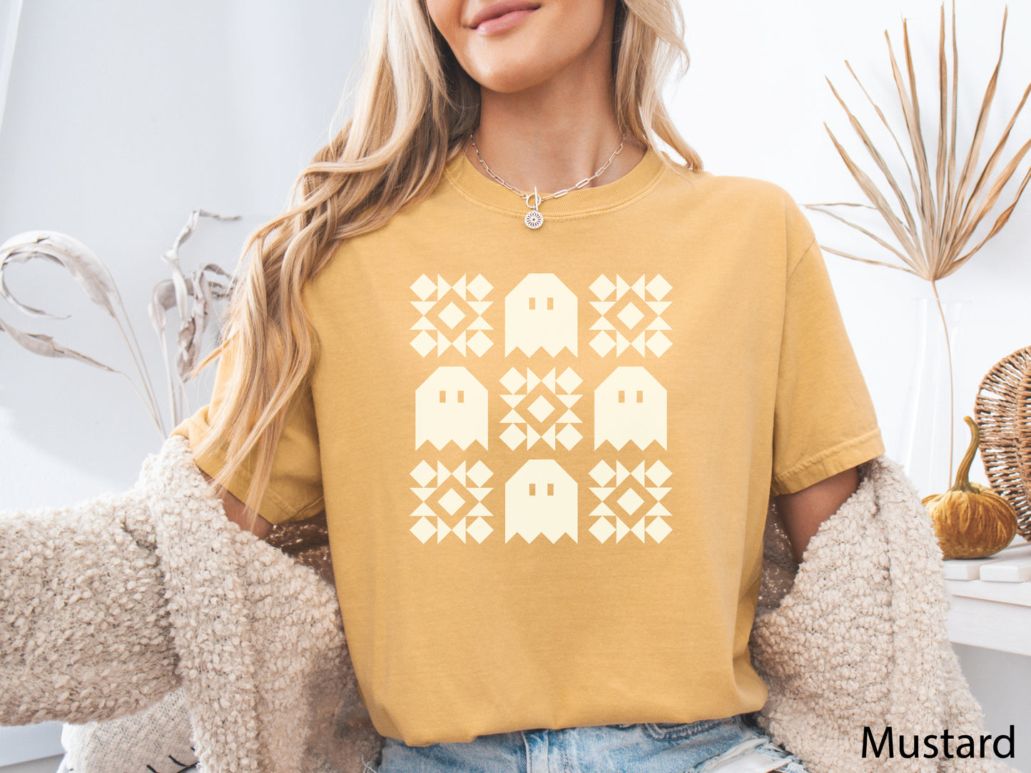 Halloween quilt t-shirt in Comfort Colors Mustard with spooky ghost quilt blocks in a grid design—fun fall gift for quilters.