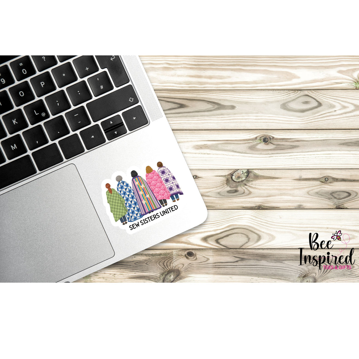 Quilt Gang Member sticker featuring five women standing together wrapped in colorful patterned quilts celebrating quilting friendship.