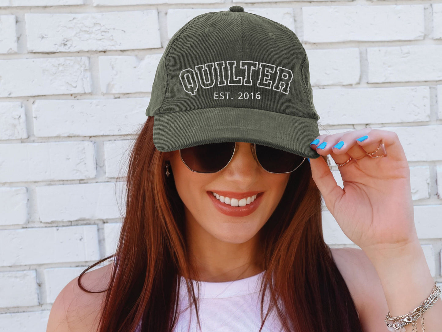 Vintage corduroy hat embroidered with “QUILTER,” personalized with the quilter’s start year, shown in multiple color options—an ideal gift for quilting lovers and sewing enthusiasts.