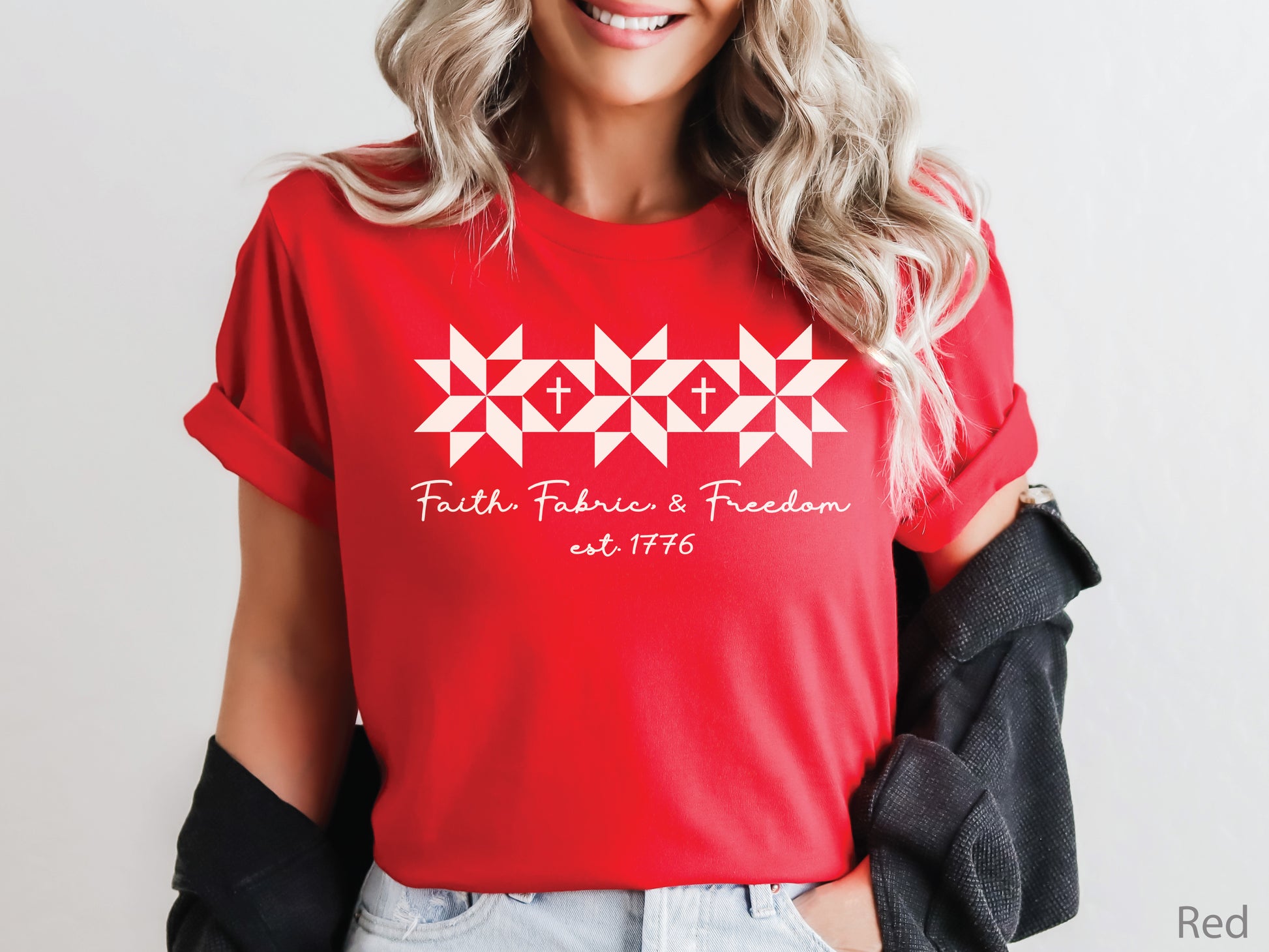Blue t-shirt with Faith, Fabric & Freedom design featuring quilt star blocks with cross details, ideal for quilters and faith-based patriotic wear.