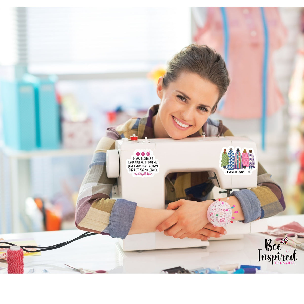 Sew Sisters United sticker featuring five quilters wrapped in colorful quilts. A fun friendship gift for quilting friends, guild members, and retreat buddies.