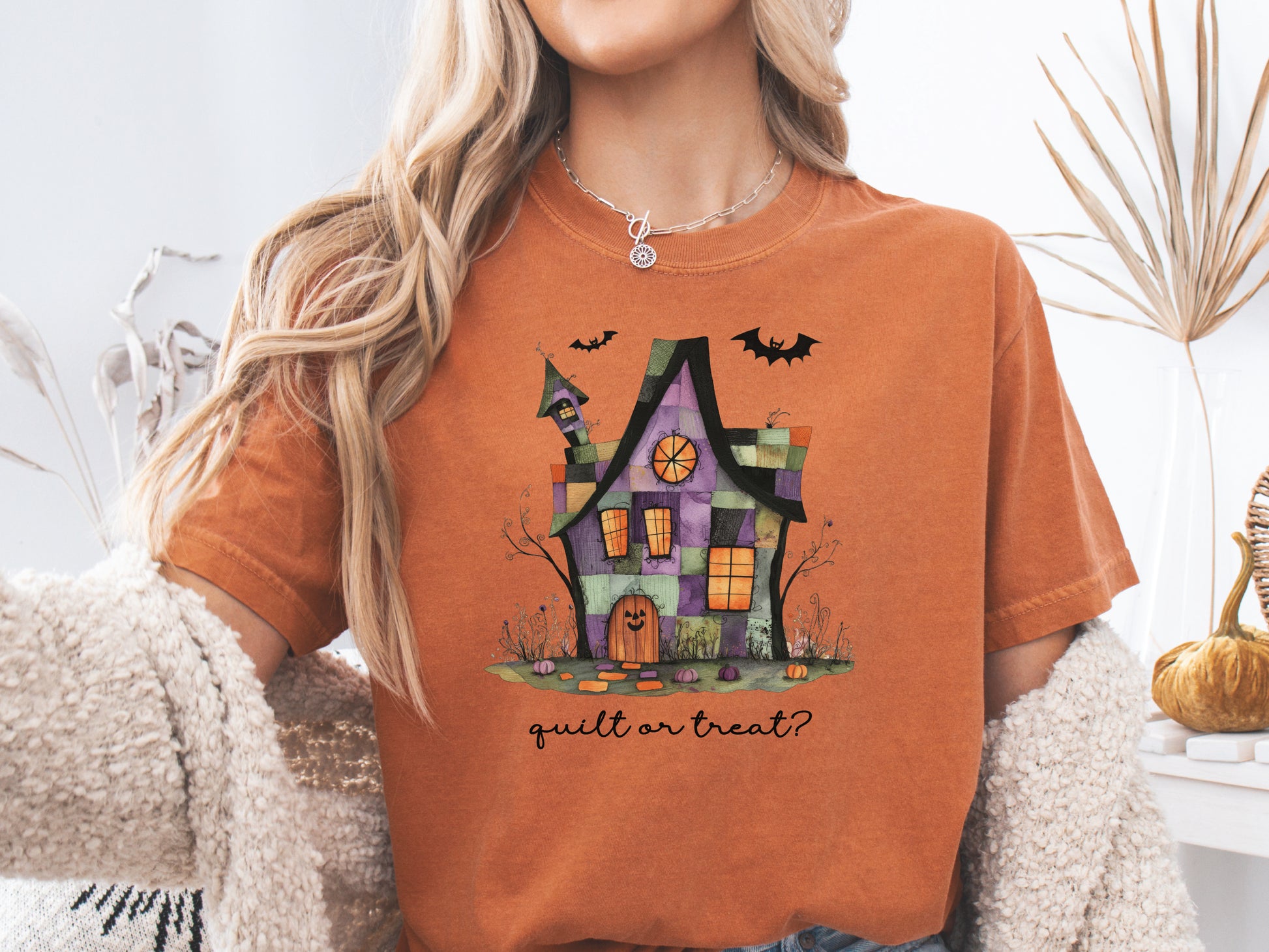 Quilt or Treat Halloween t-shirt on a Comfort Colors Yam tee—fun Halloween gift for quilters, perfect for spooky season sewing and retreats.