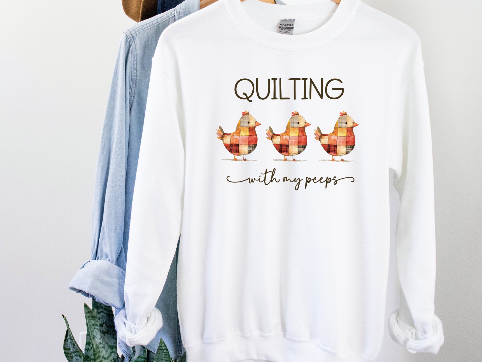 Quilting With My Peeps sweatshirt featuring colorful patchwork baby chicks, a fun gift for quilters and sewists from Bee Inspired Tees—perfect for retreats, sewing days, and cozy everyday wear.
