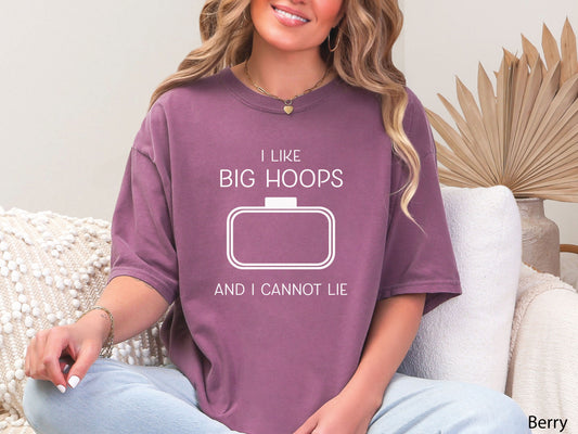 Embroidery-themed t-shirt with the phrase “I Love Big Hoops And Cannot Lie” and an embroidery hoop centered in the design for machine embroidery lovers.