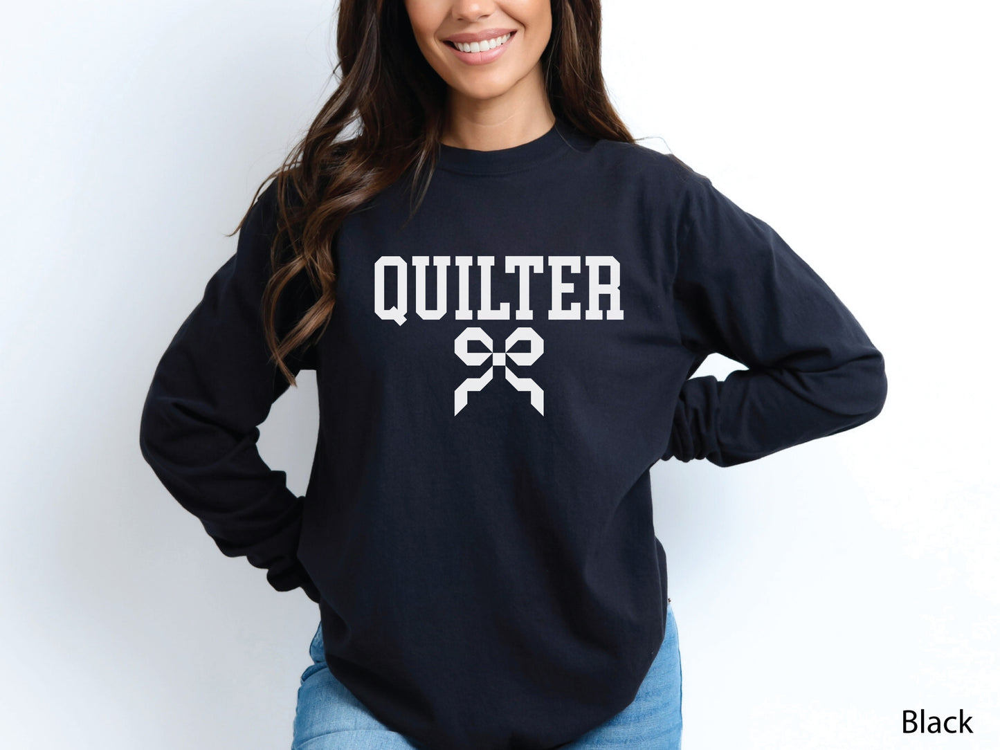 Cozy sweatshirt with bold varsity-style “Quilter” lettering and a coquette bow — perfect for quilt retreats, guild meetings, or as a thoughtful gift for quilters.