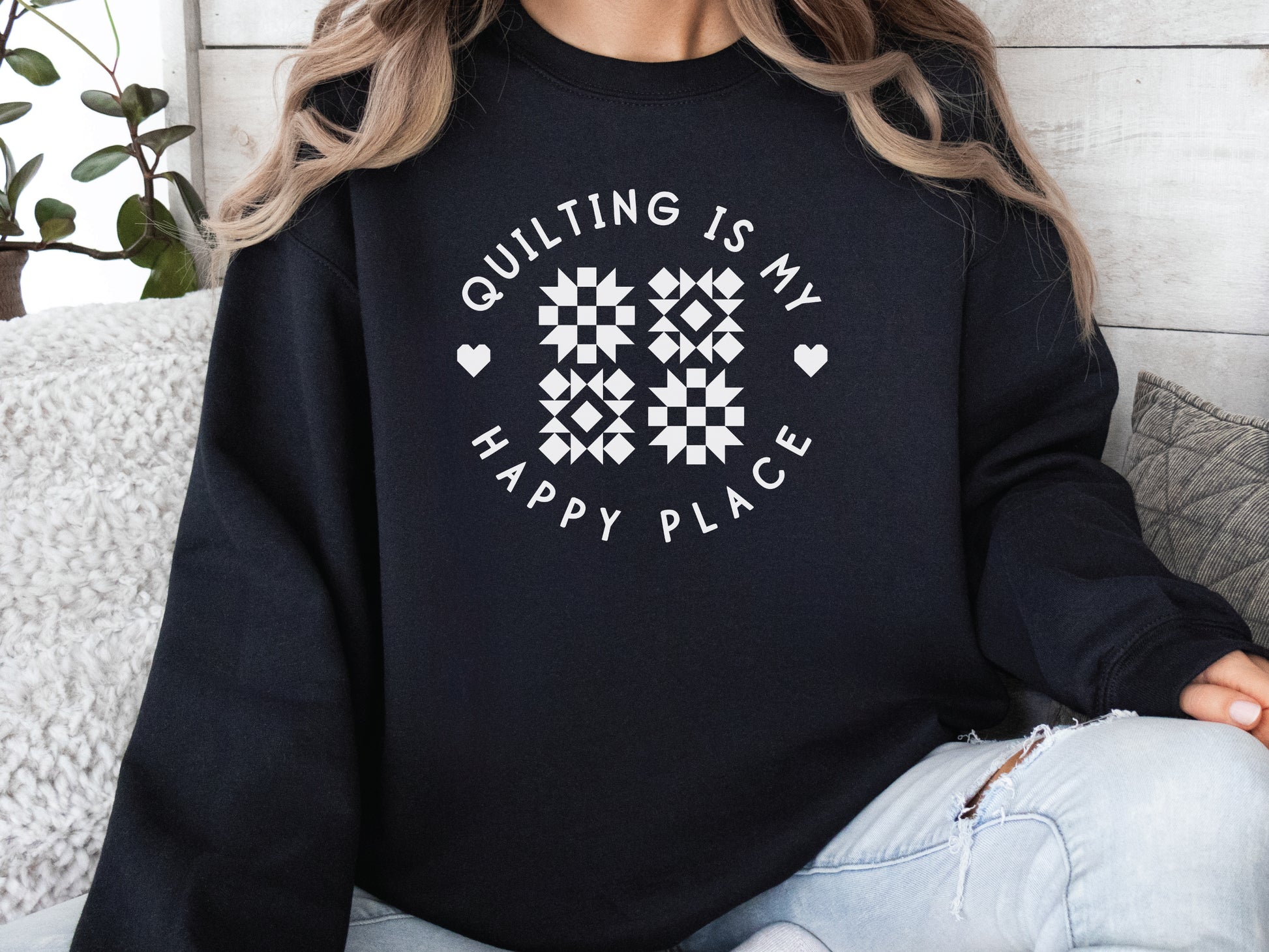 Cozy unisex sweatshirt with the phrase “Quilting Is My Happy Place” printed on the front — perfect for quilters and sewists who love to create.
