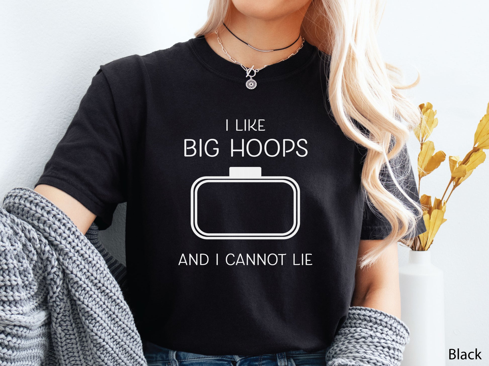 Embroidery-themed t-shirt with the phrase “I Love Big Hoops And Cannot Lie” and an embroidery hoop centered in the design for machine embroidery lovers.