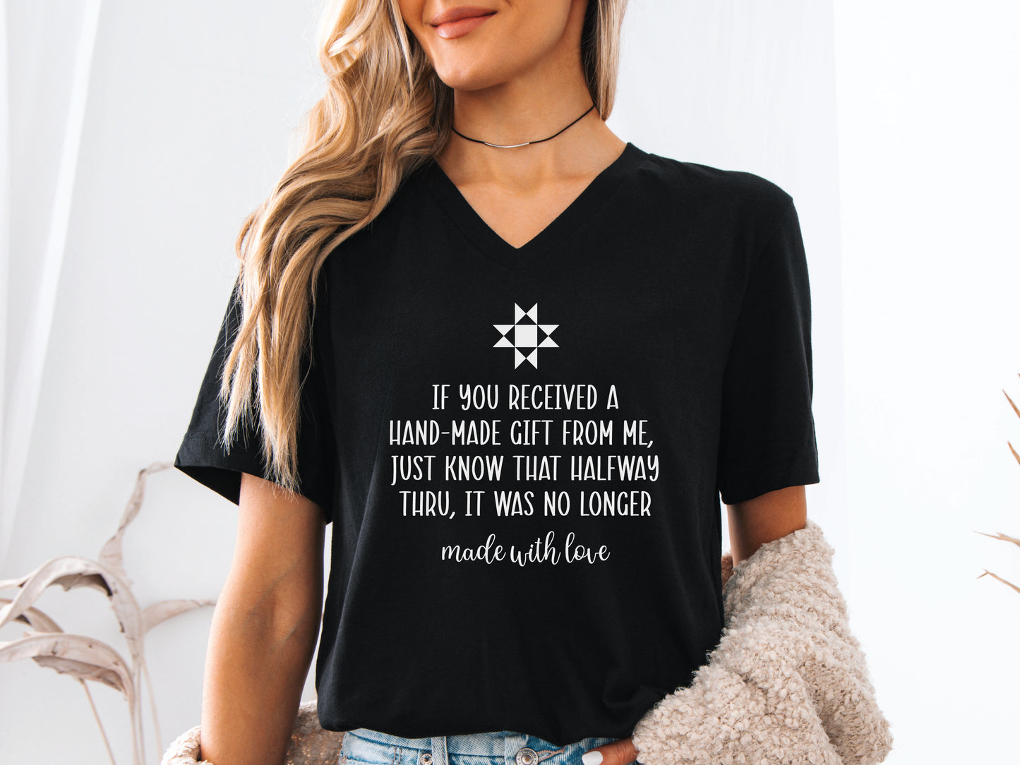 Funny quilt-themed V-neck t-shirt with humorous handmade gift quote, perfect for quilters, quilt retreats, and quilting events.
