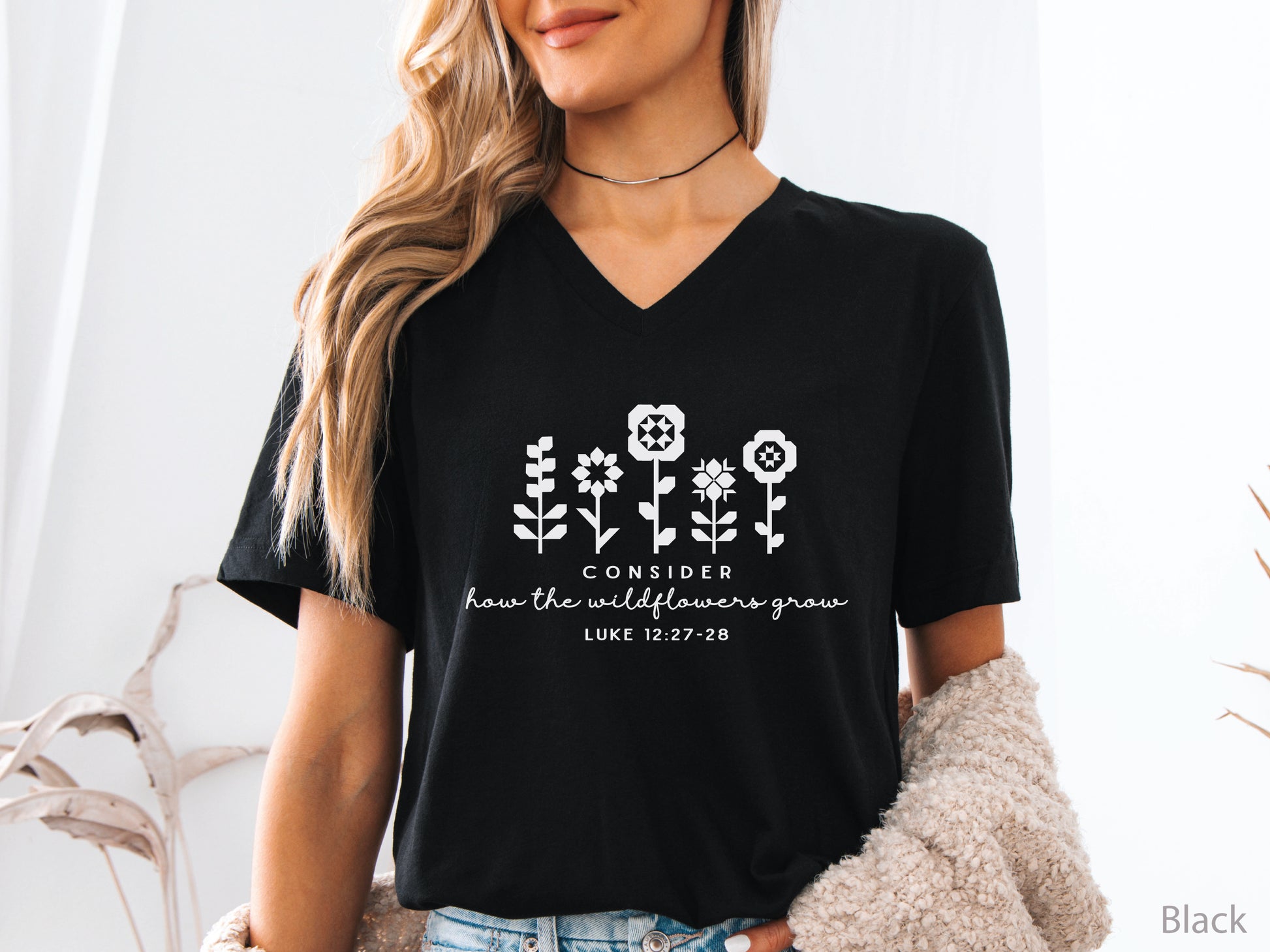 Quilt-inspired wildflower design t-shirt featuring Bible verse Luke 12:27–28, perfect for quilters and faith-based apparel.
