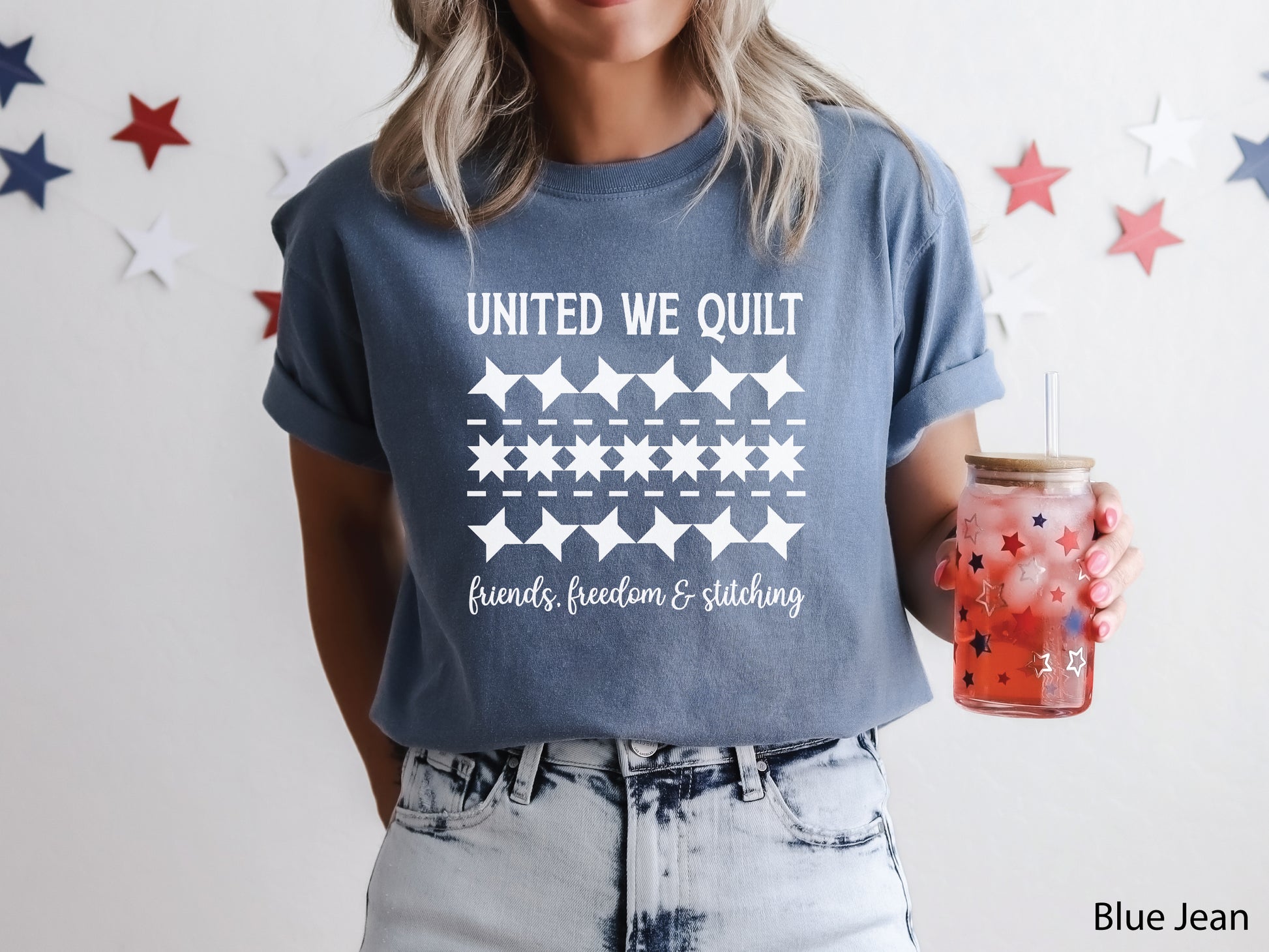 United We Quilt t-shirt with rows of friendship quilt blocks and the phrase Friends, Freedom & Stitching, a fun patriotic shirt for quilters and sewists.