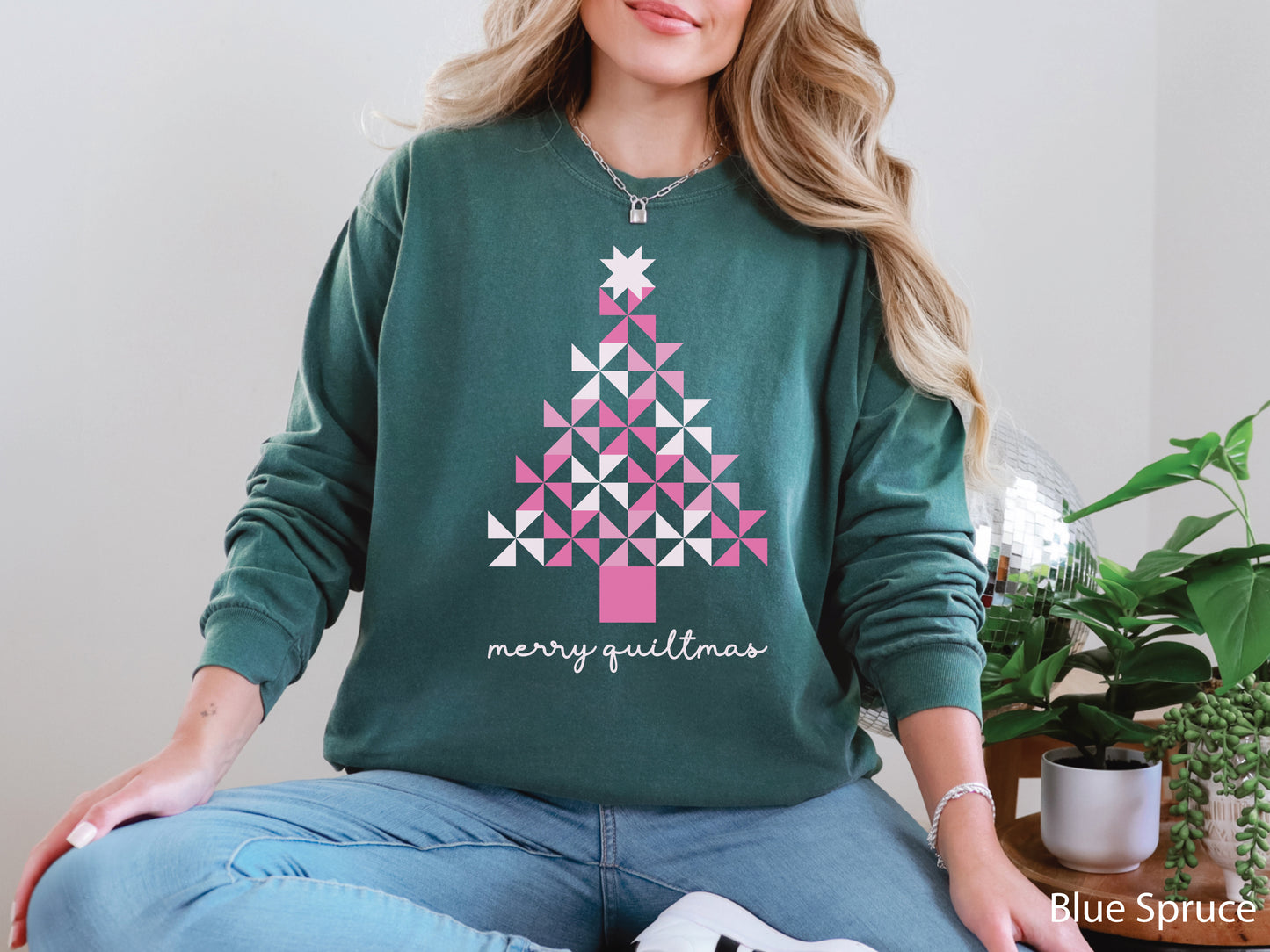 Long sleeve T-shirt with a Christmas tree made of pink pinwheel quilt blocks — festive Merry Quiltmas design and perfect holiday gift for quilters and sewing lovers.