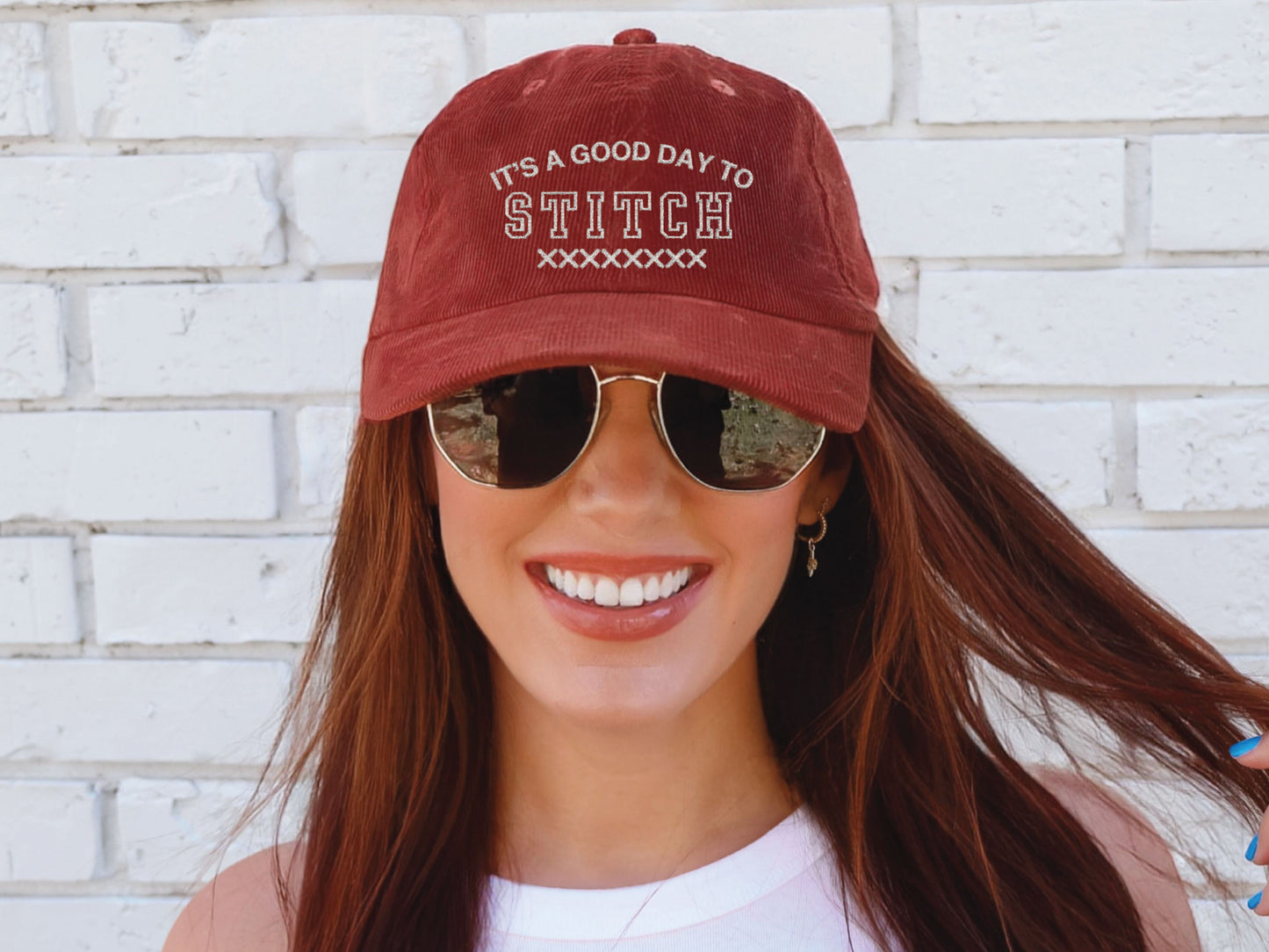 Vintage corduroy hat embroidered with the phrase “It’s a Good Day to Stitch,” shown in multiple color options—an ideal gift for cross stitch, embroidery, and needlework lovers.