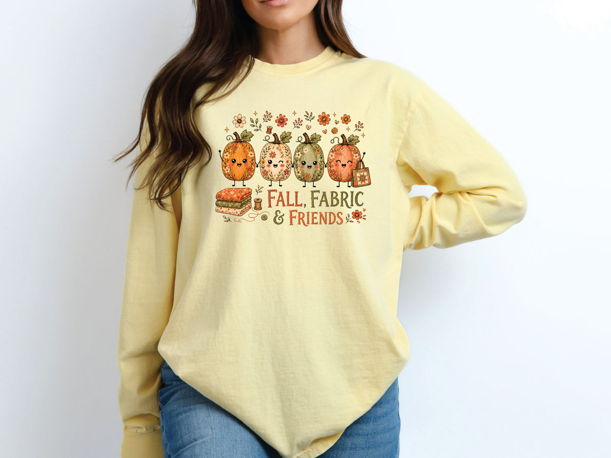 Fall, Fabric & Friends long sleeve quilting T-shirt with four floral pumpkins, autumn flowers, sewing details, colorful fabric and a patchwork quilt tote.