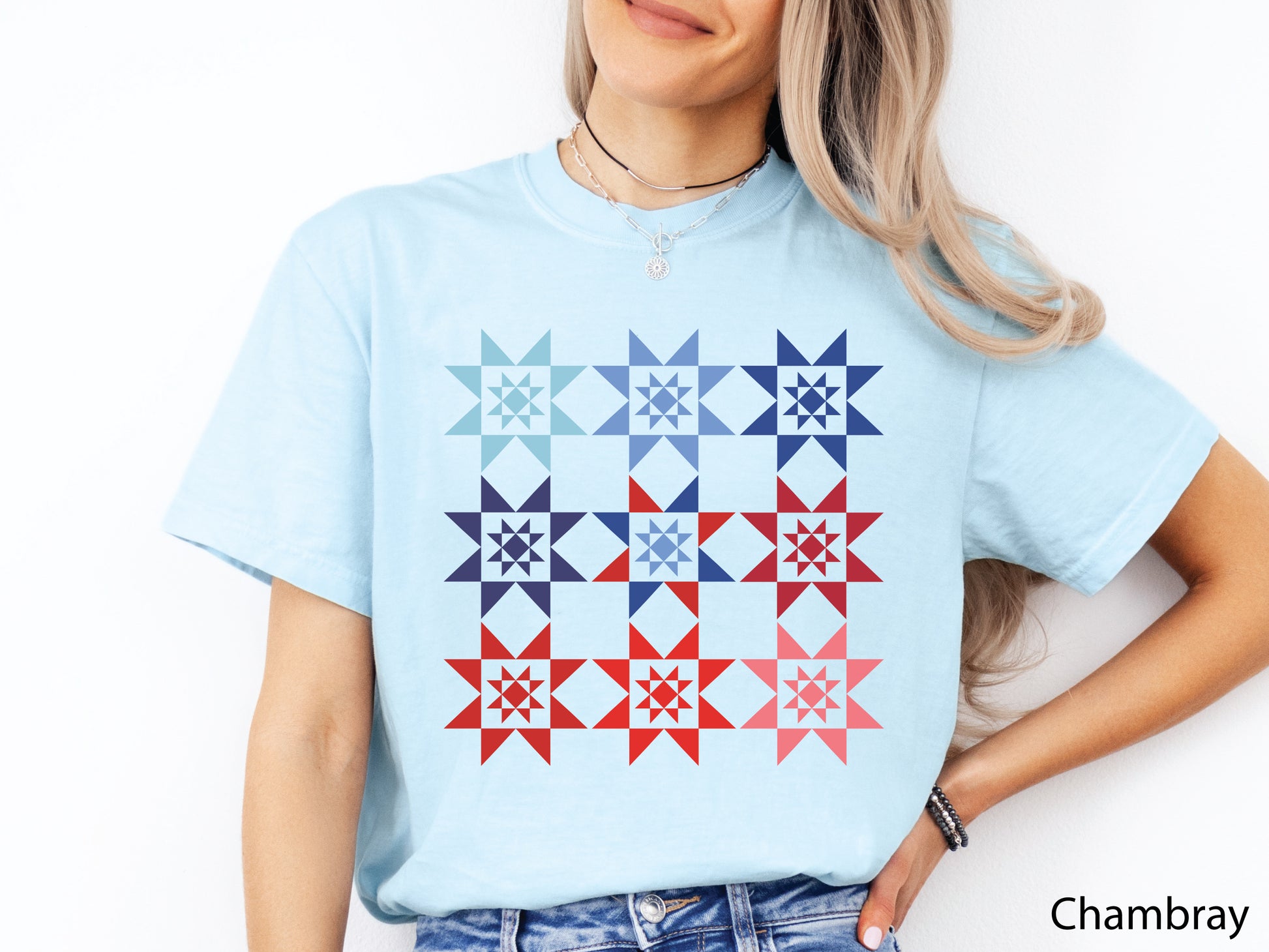 Patriotic Ombre Quilting T-Shirt featuring nine Evening Star quilt blocks arranged in a red, white, and blue ombre pattern on a Comfort Colors® shirt, celebrating America’s 250th Anniversary.
