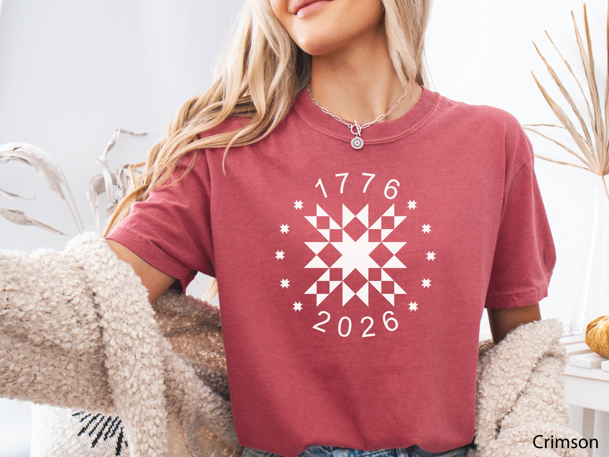 Patriotic quilting t-shirt in navy featuring a white star quilt block with surrounding stars and the years 1776–2026, celebrating America’s 250th Anniversary.