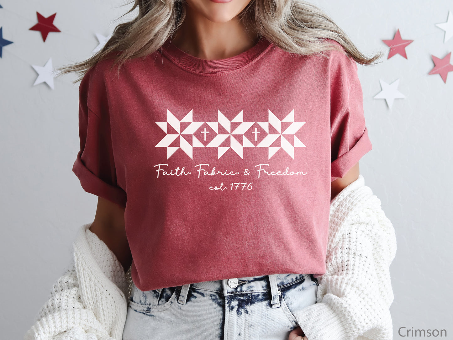 Blue t-shirt with Faith, Fabric & Freedom design featuring quilt star blocks with cross details, ideal for quilters and faith-based patriotic wear.