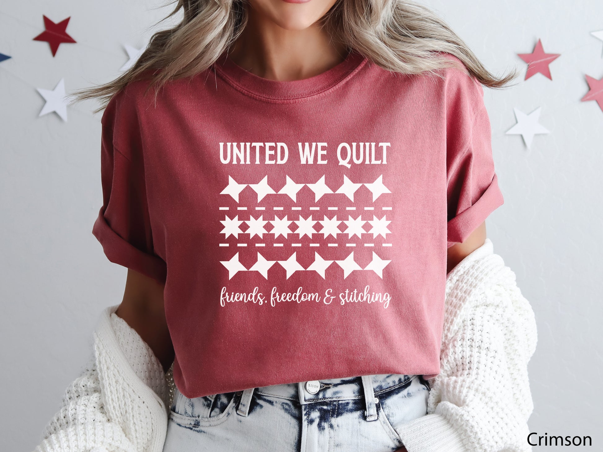 United We Quilt t-shirt with rows of friendship quilt blocks and the phrase Friends, Freedom & Stitching, a fun patriotic shirt for quilters and sewists.