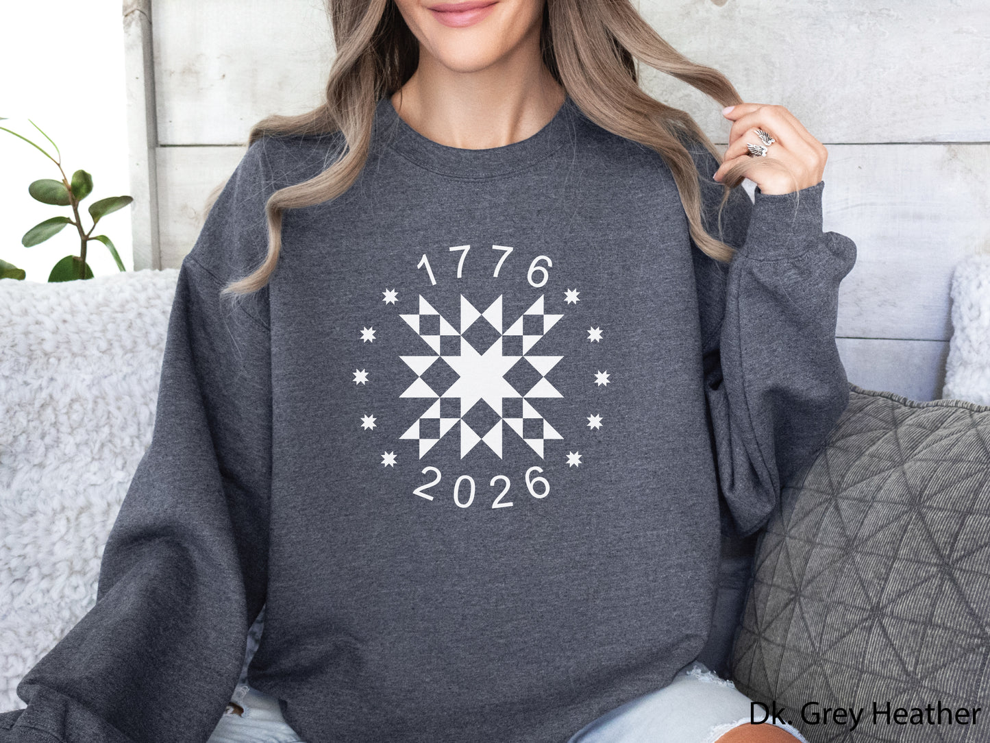 Patriotic quilting sweatshirt featuring a white star quilt block with surrounding stars and the years 1776–2026, celebrating America’s 250th Anniversary. Makes a great valor quilter gift.