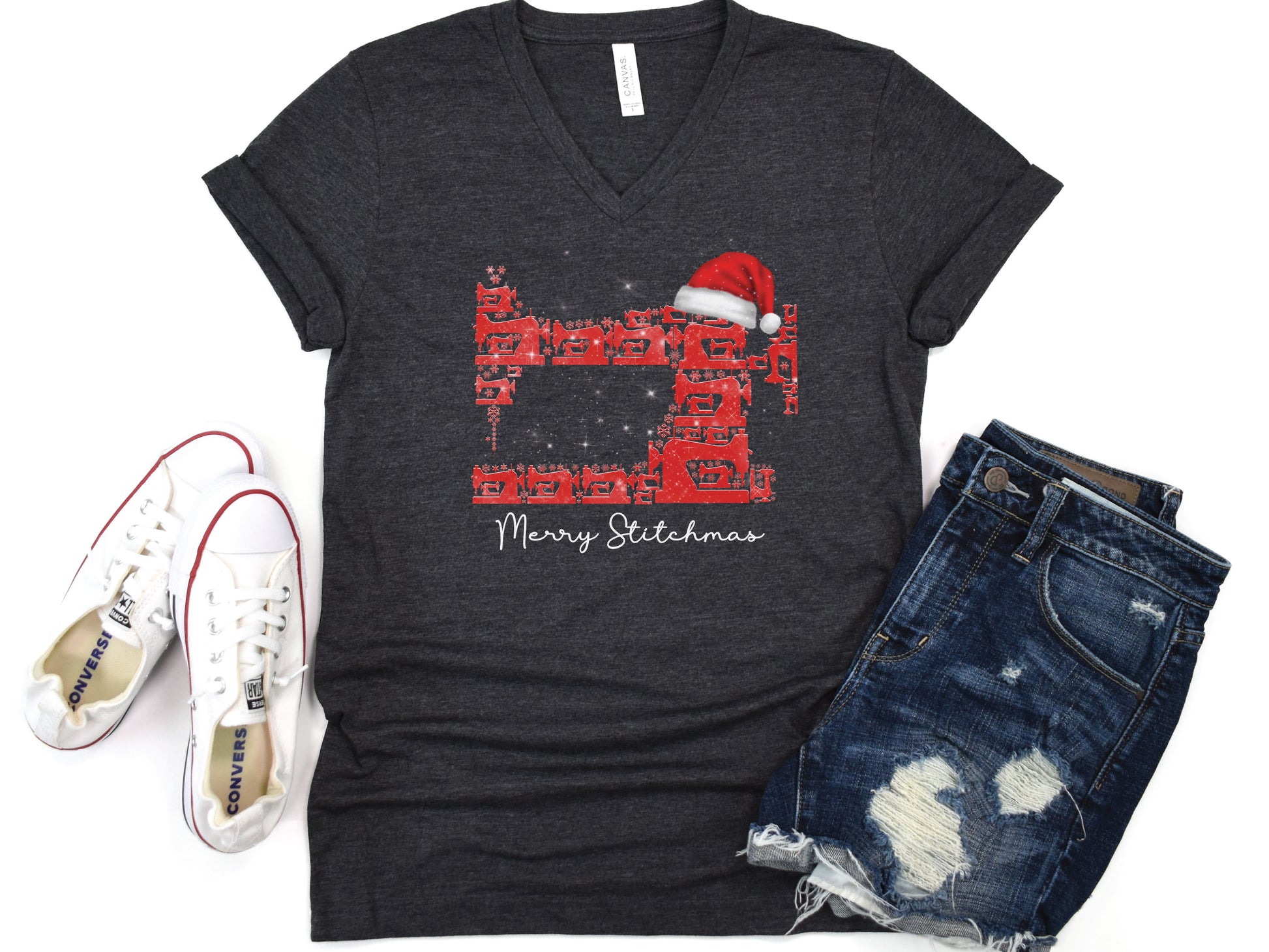 Sewing-themed Christmas design featuring a sewing-machine tree with a Santa hat and “Merry Stitchmas” text on a V-neck t-shirt — fun holiday gift for quilters and sewists.