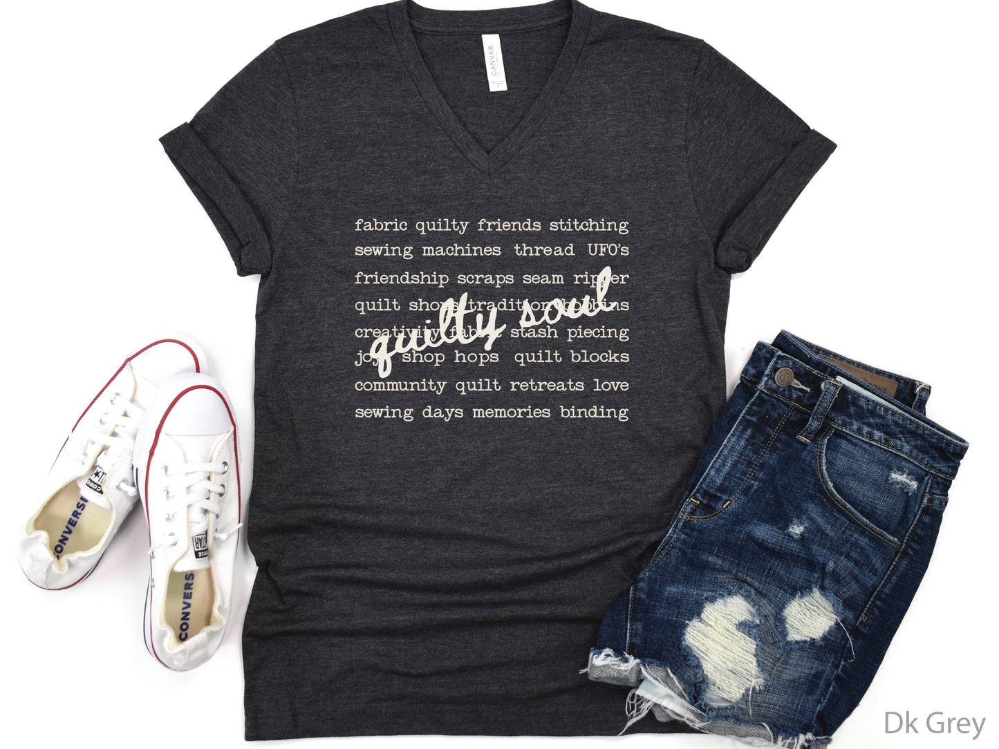 Vintage-inspired Quilty Soul t-shirt featuring a typewriter-style mix of quilting words with flowing handwritten script, perfect for quilters, everyday wear, quilt retreats, Halloween, and spooky season.
