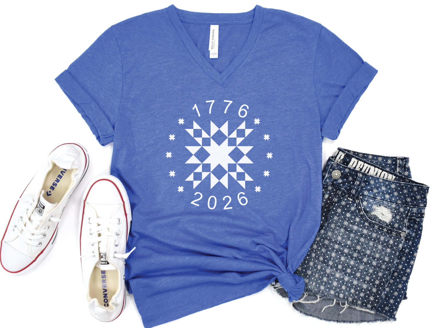 Patriotic quilting t-shirt in navy featuring a white star quilt block with surrounding stars and the years 1776–2026, celebrating America’s 250th Anniversary.