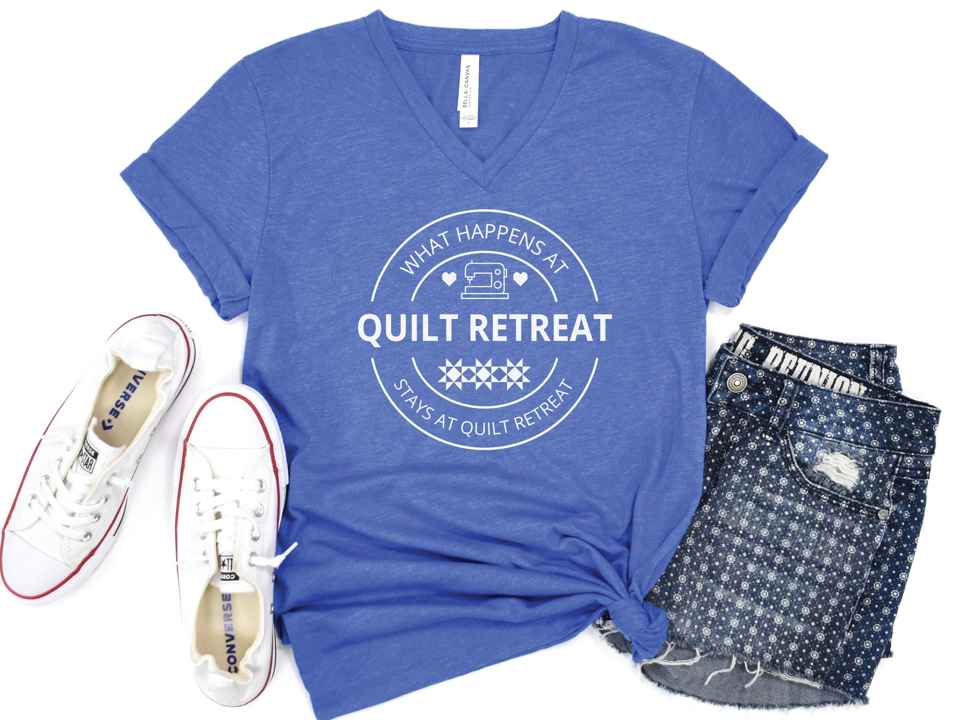 What Happens at Quilt Retreat t-shirt in black, fun quilting-themed gift for quilters and stitching crews. Heather Royal Bella V-Neck Shirt.