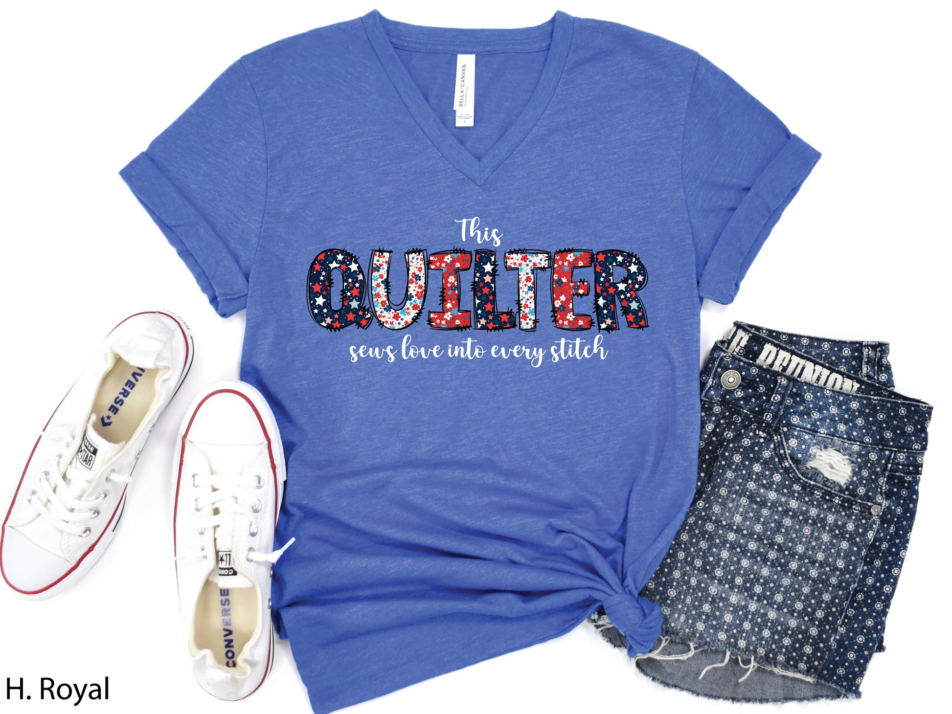Patriotic quilting t-shirt with the phrase “This Quilter Sews Love Into Every Stitch” in red, white, and blue patchwork lettering, perfect for celebrating America’s 250th Anniversary.