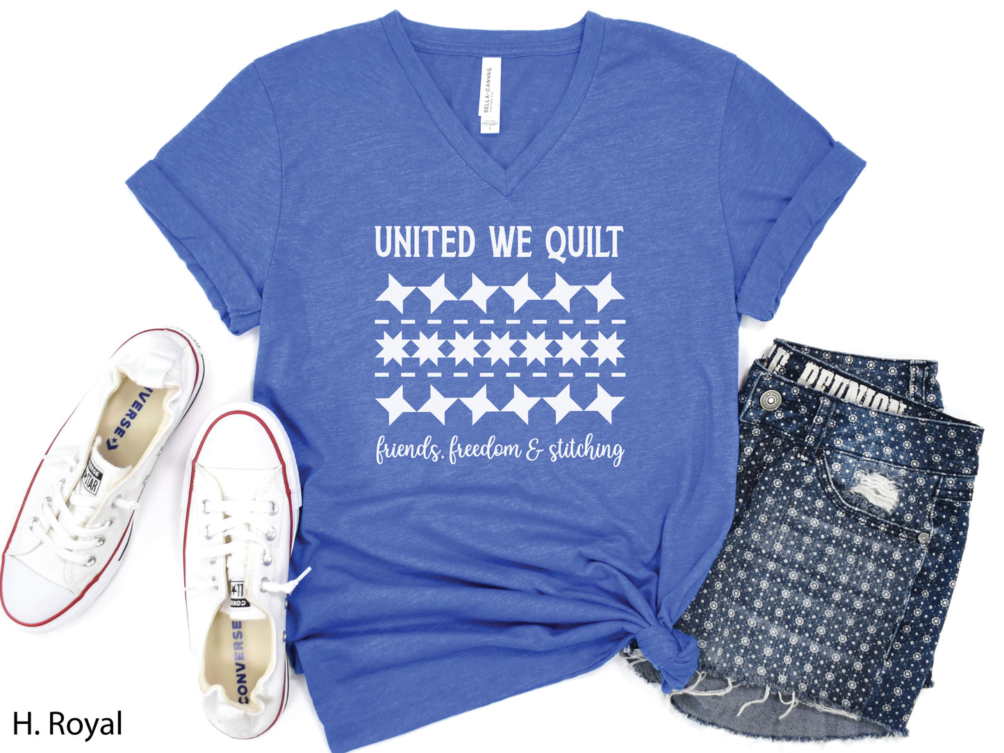 United We Quilt t-shirt with rows of friendship quilt blocks and the phrase Friends, Freedom & Stitching, a fun patriotic shirt for quilters and sewists.