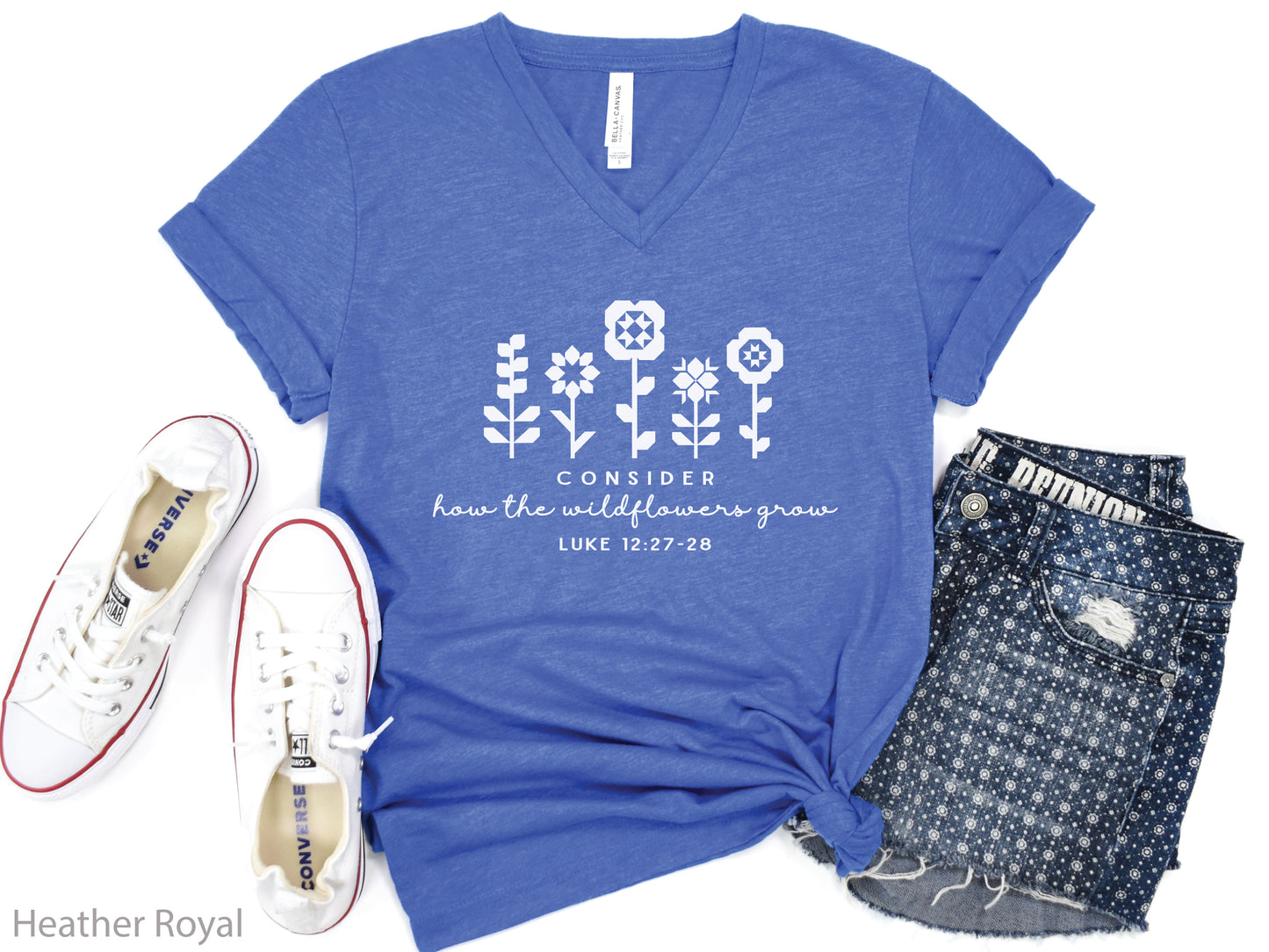Quilt-inspired wildflower design t-shirt featuring Bible verse Luke 12:27–28, perfect for quilters and faith-based apparel.