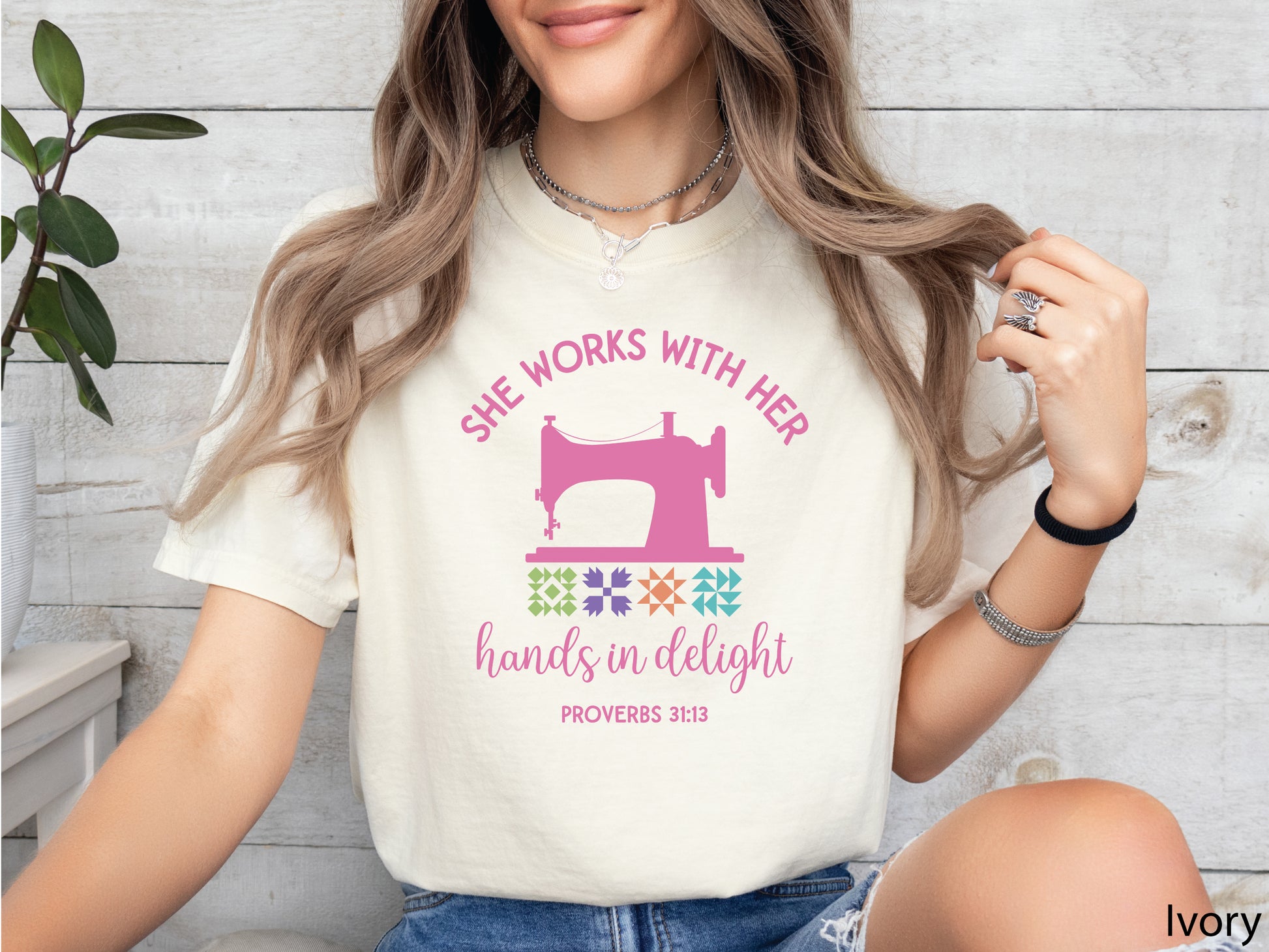 Quilting t-shirt with vintage sewing machine, quilt blocks, and Proverbs 31:13 verse, perfect for faith-based quilters and sewing enthusiasts.