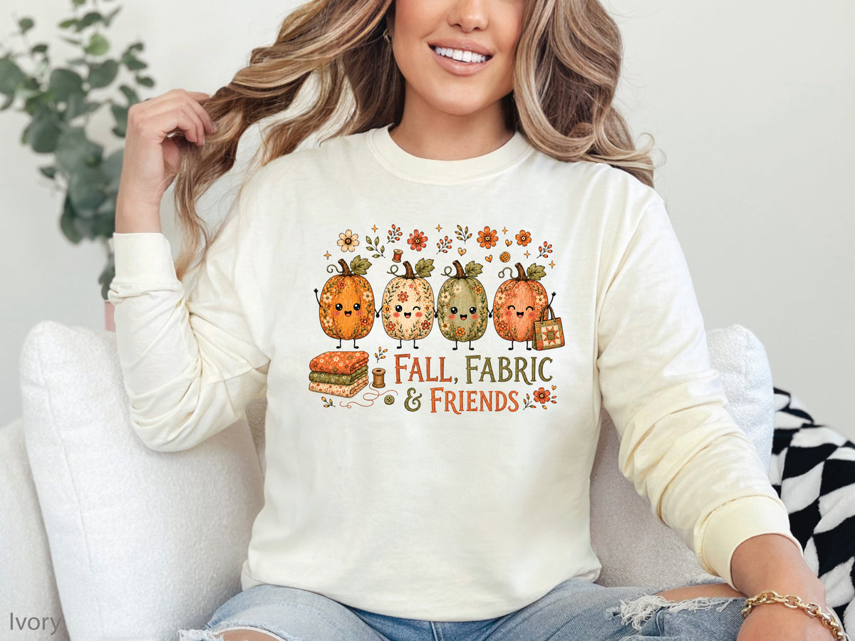 Fall, Fabric & Friends long sleeve quilting T-shirt with four floral pumpkins, autumn flowers, sewing details, colorful fabric and a patchwork quilt tote.