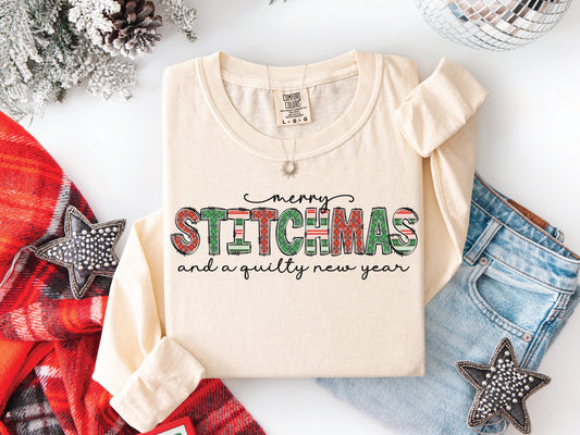 Festive Merry Stitchmas & a Quilty New Year t-shirt with red, green patchwork lettering—perfect holiday gift for quilters and sewists.