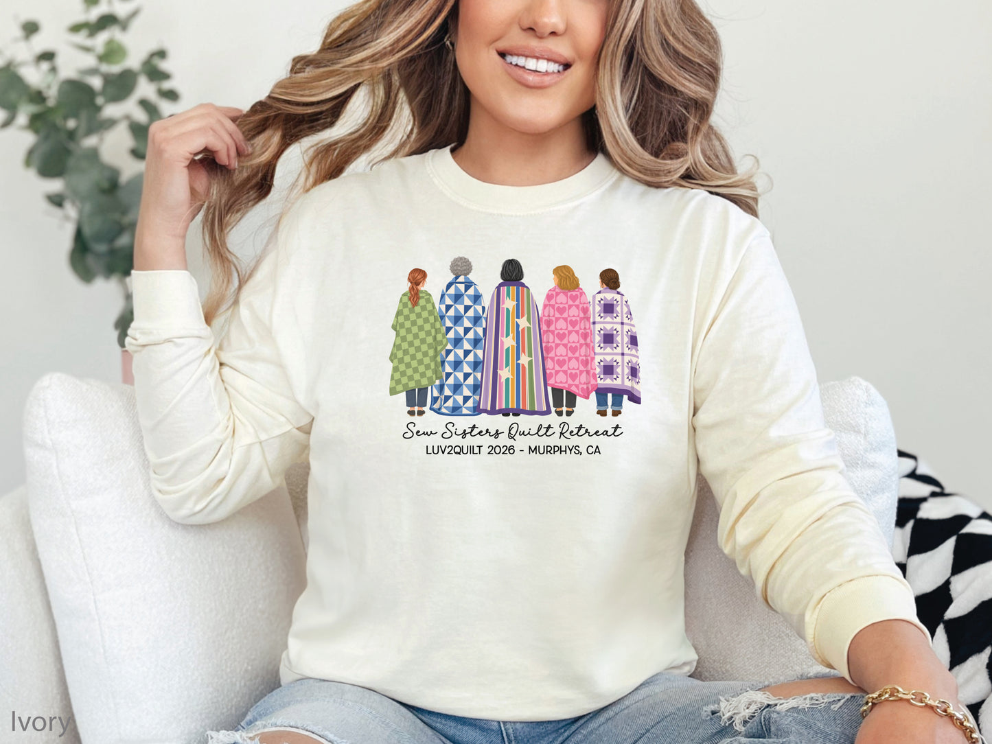 Sew Sisters Quilt Retreat long-sleeved shirt design featuring five women wrapped in colorful green, blue, striped, pink heart, and purple quilts with LUV2QUILT 2026 personalized text.