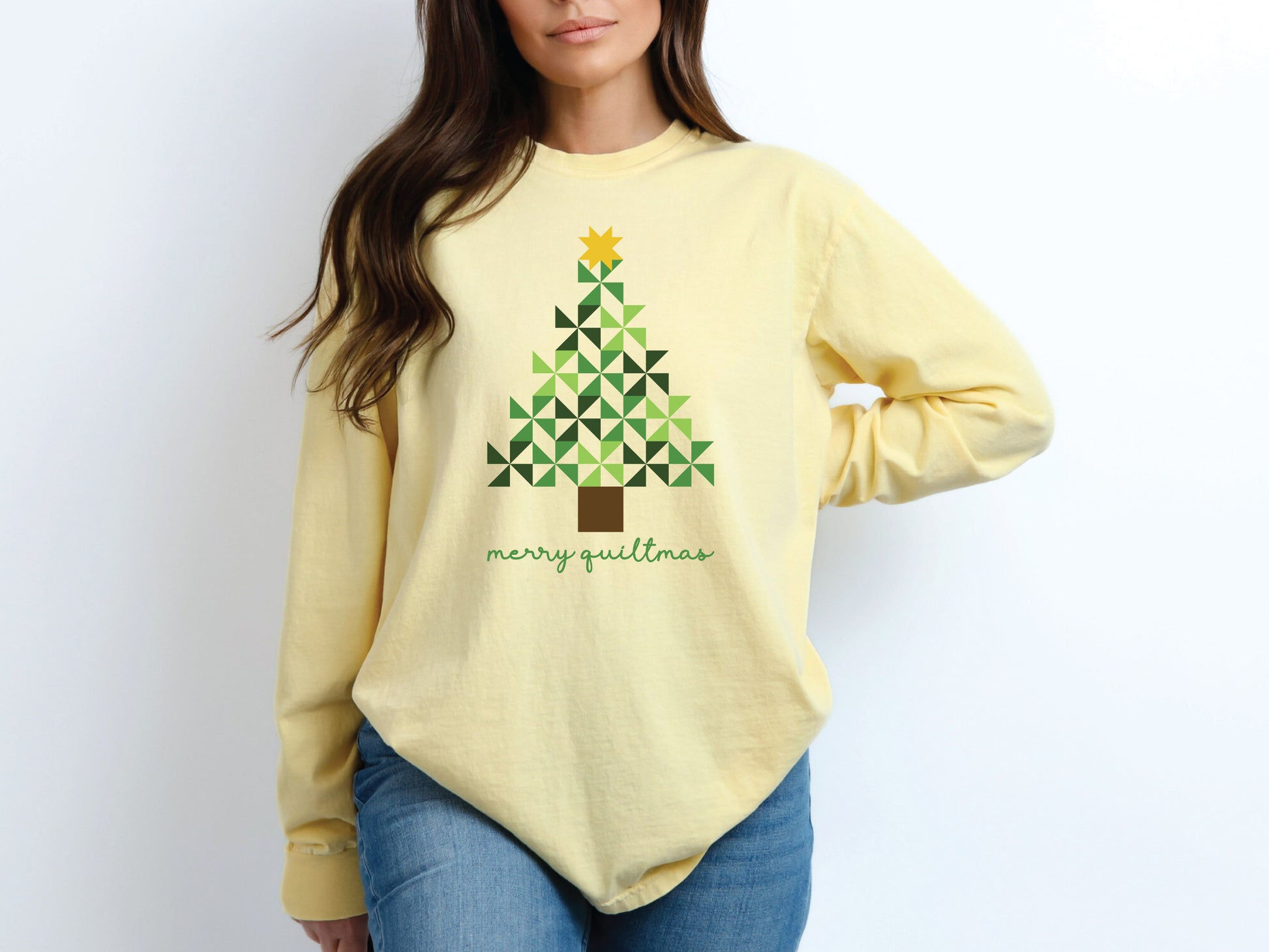 Merry Quiltmas t-shirt in Yellow (Butter) with quilt block Christmas tree design in green pinwheel blocks topped with gold star—holiday gift for quilters. Shop at Bee Inspired Tees for sewing and quilt-themed short and long sleeve t-shirts, gifts, and stickers designed for passionate sewists and quilters.