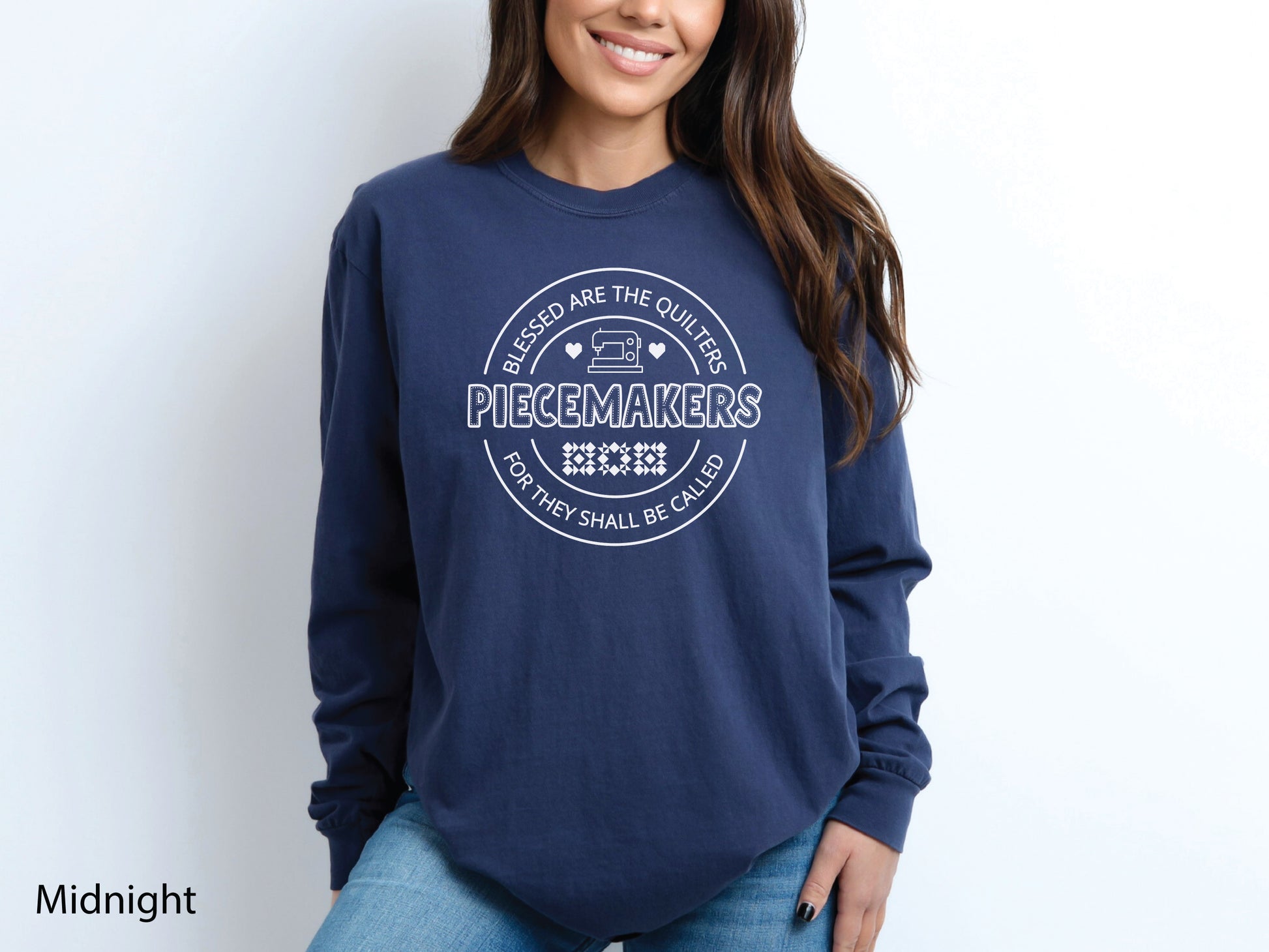 A long-sleeve quilting t-shirt from Bee Inspired Tees featuring the phrase “Piecemaker – Quilters Are Blessed,” celebrating creativity, faith, and the art of quilting; a cozy gift for quilters and perfect for retreats or sewing days.